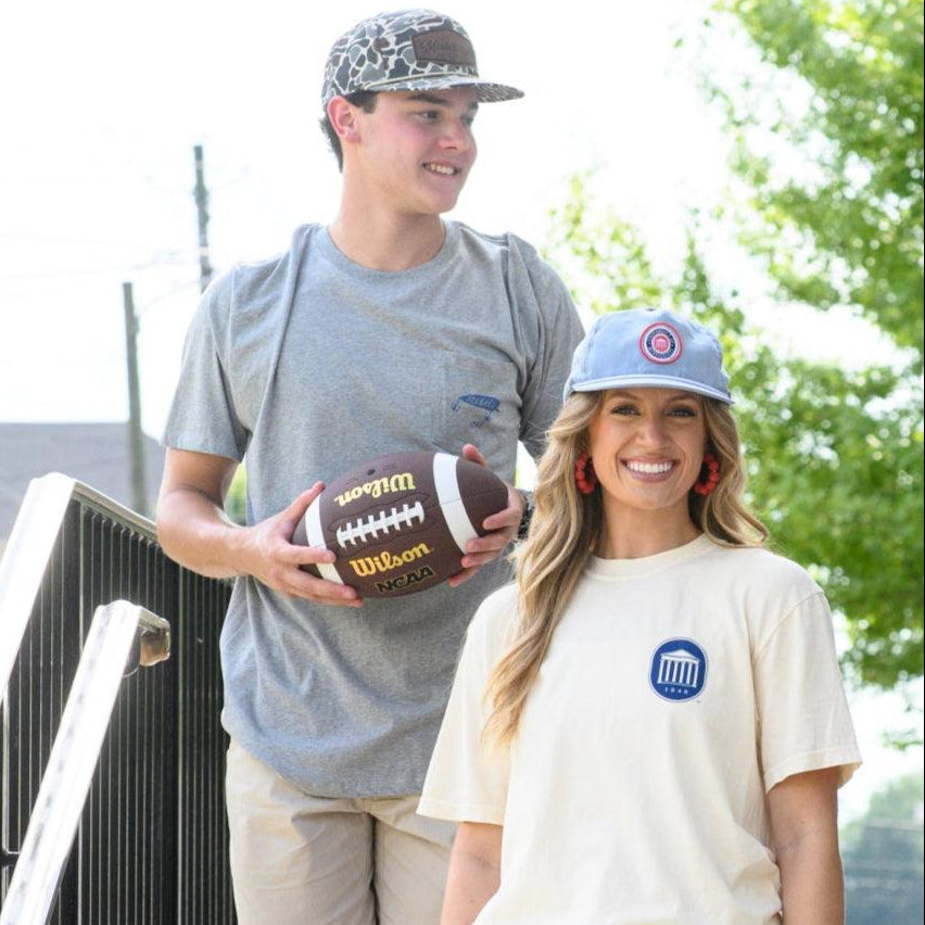 Ole Miss Camo Hat with a Leather patch with text “Mississippi University”