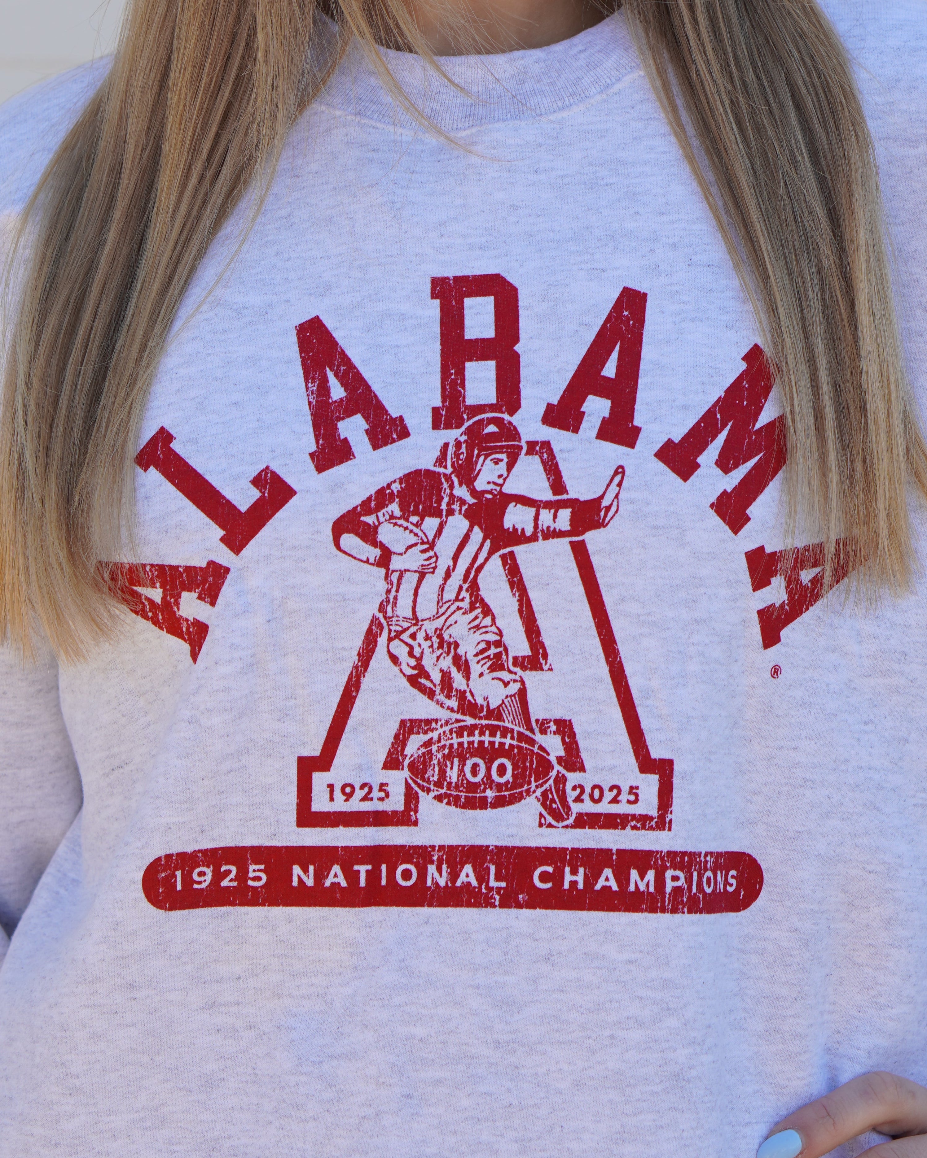 University of Alabama Light Grey Sweatshirt with Red text “Alabama” above a Block A with an old-fashioned football player