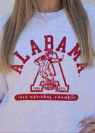 University of Alabama Light Grey Sweatshirt with Red text “Alabama” above a Block A with an old-fashioned football player