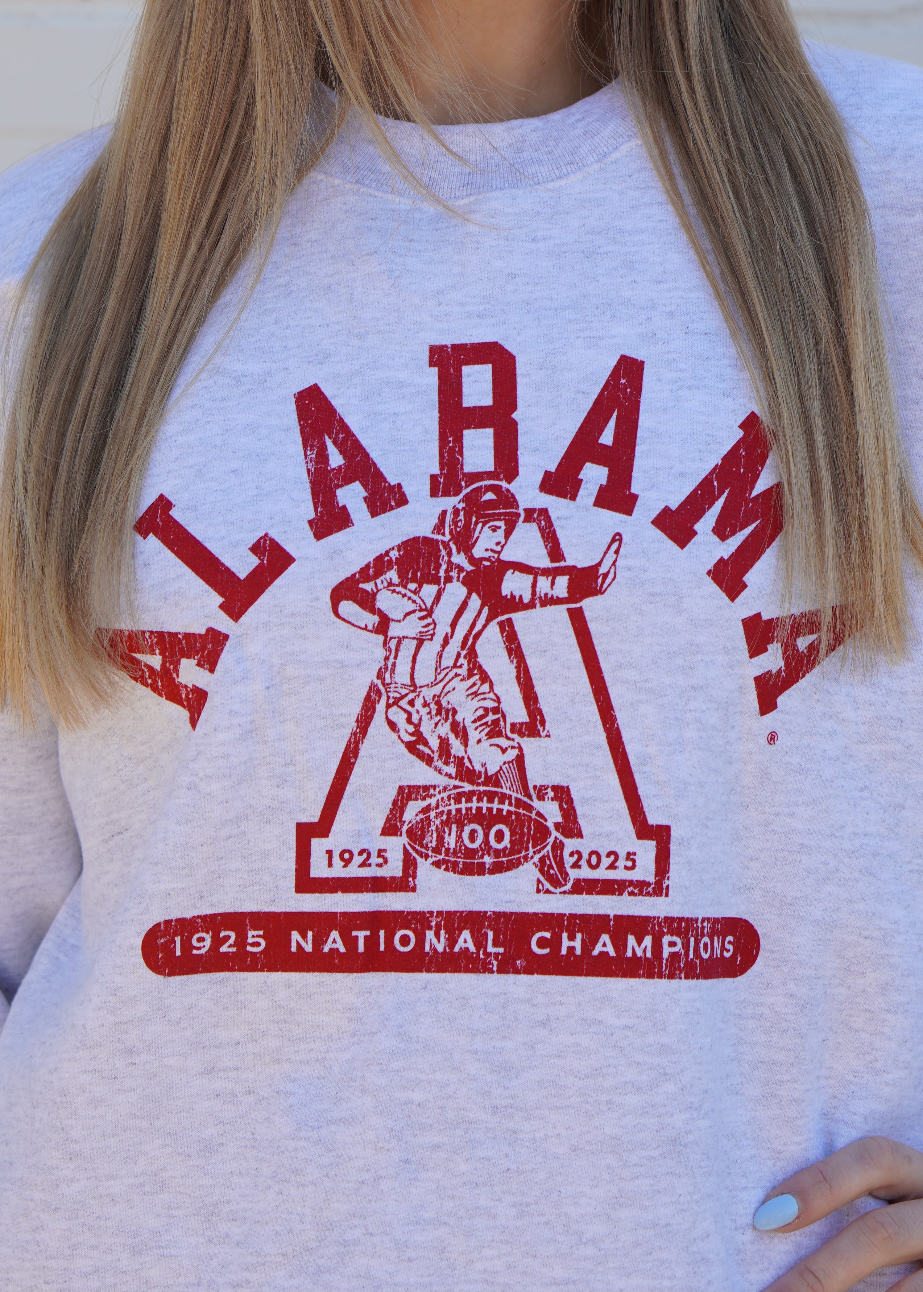 University of Alabama Light Grey Sweatshirt with Red text “Alabama” above a Block A with an old-fashioned football player