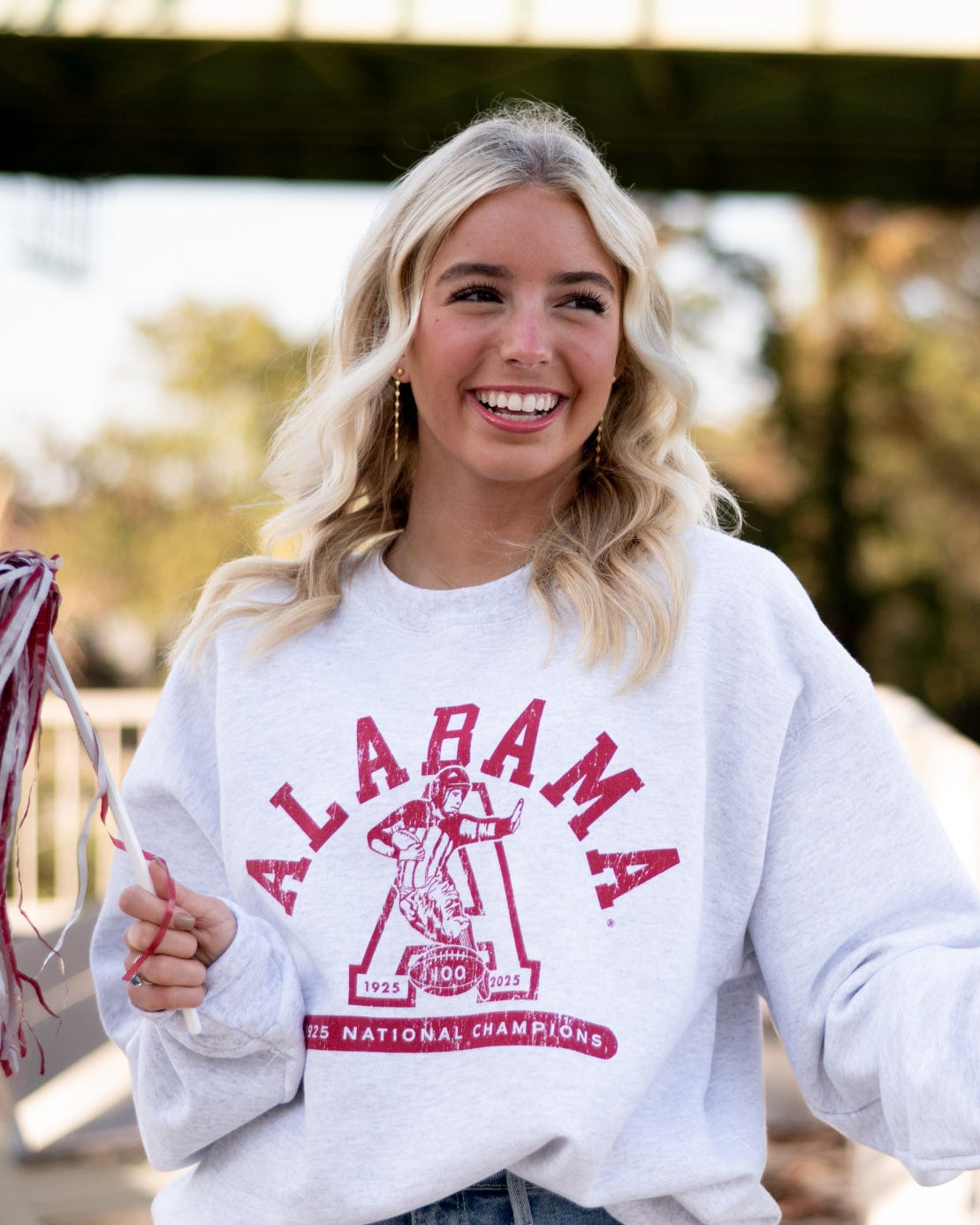 University of Alabama Light Grey Sweatshirt with Red text “Alabama” above a Block A with an old-fashioned football player