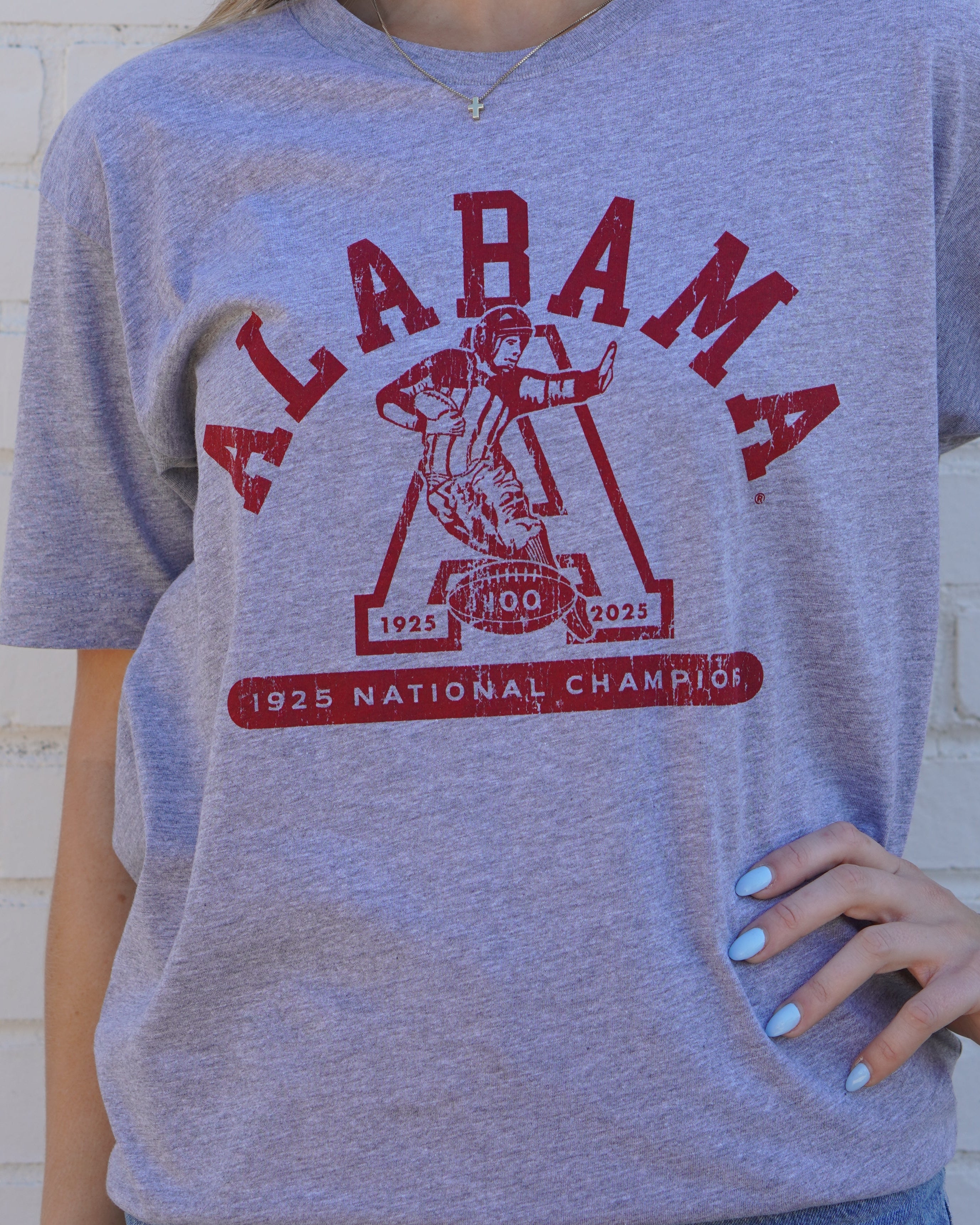 University of Alabama Grey T-Shirt with Red text “Alabama” above a Block A with an old-fashioned football player