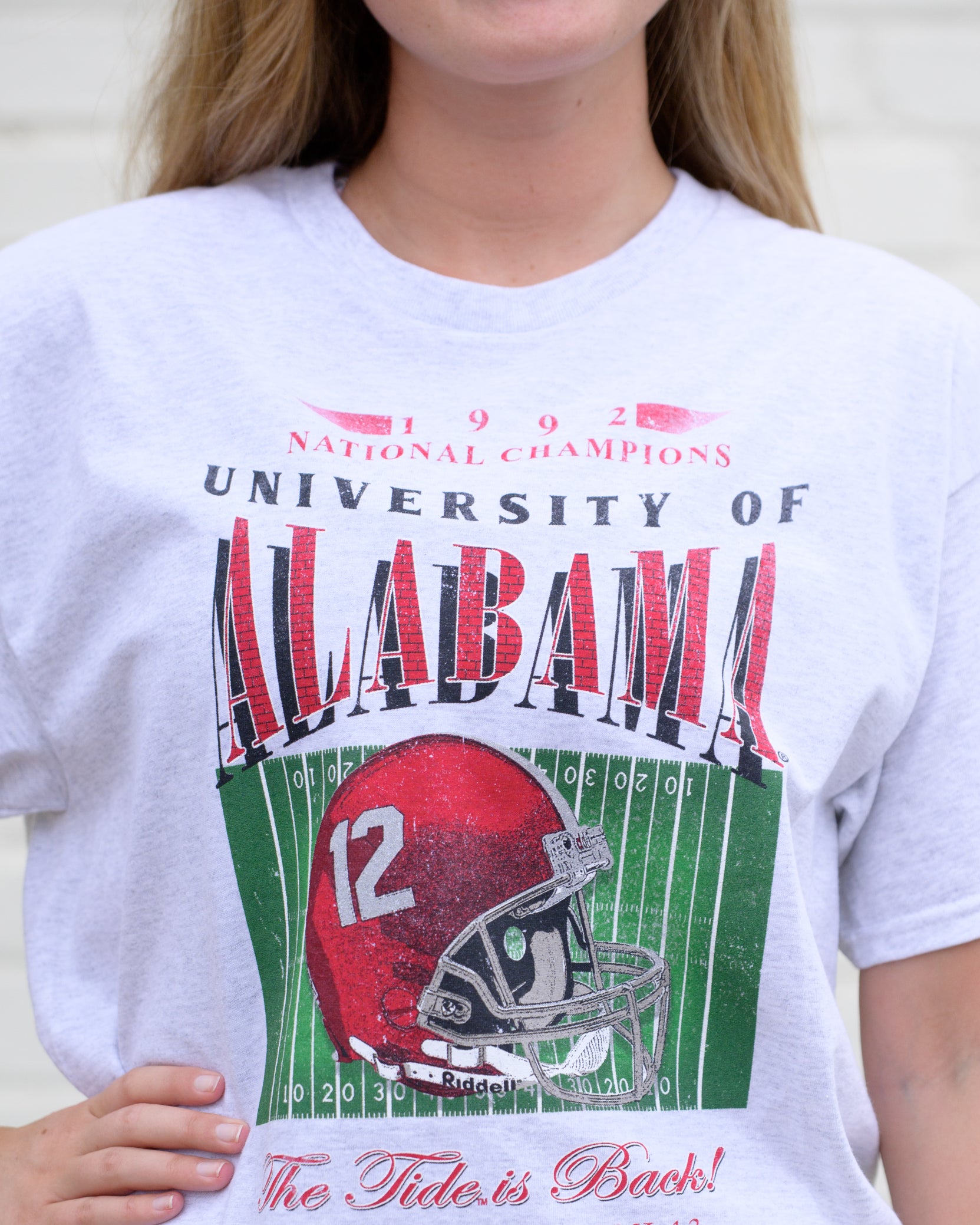 University of Alabama 1992 National Champions Comfort Colors Grey T-Shirt  with a graphic print of a football helmet and the text '1992 National Champions UNIVERSITY OF ALABAMA'.