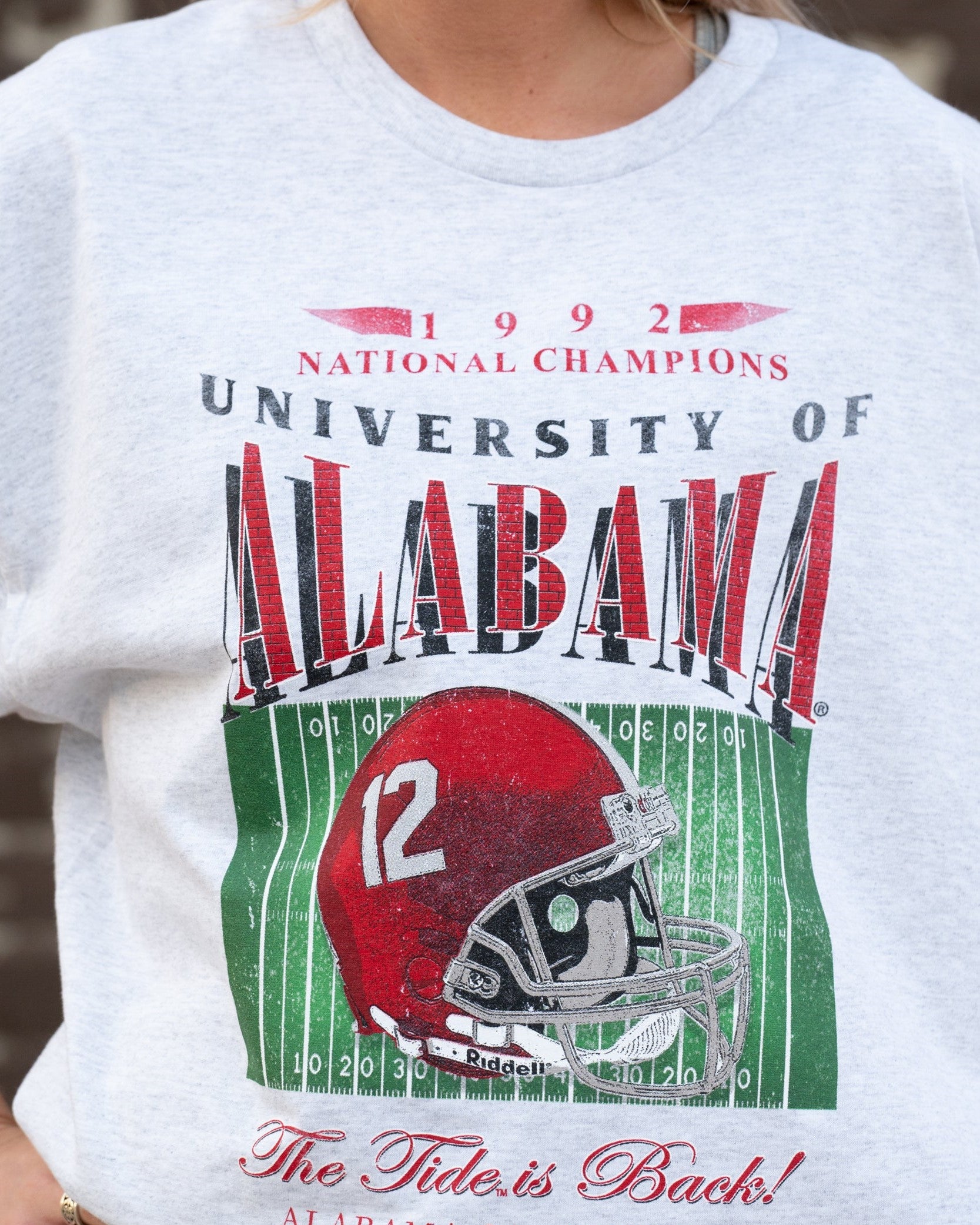 University of Alabama 1992 National Champions Comfort Colors Grey T-Shirt  with a graphic print of a football helmet and the text '1992 National Champions UNIVERSITY OF ALABAMA'.