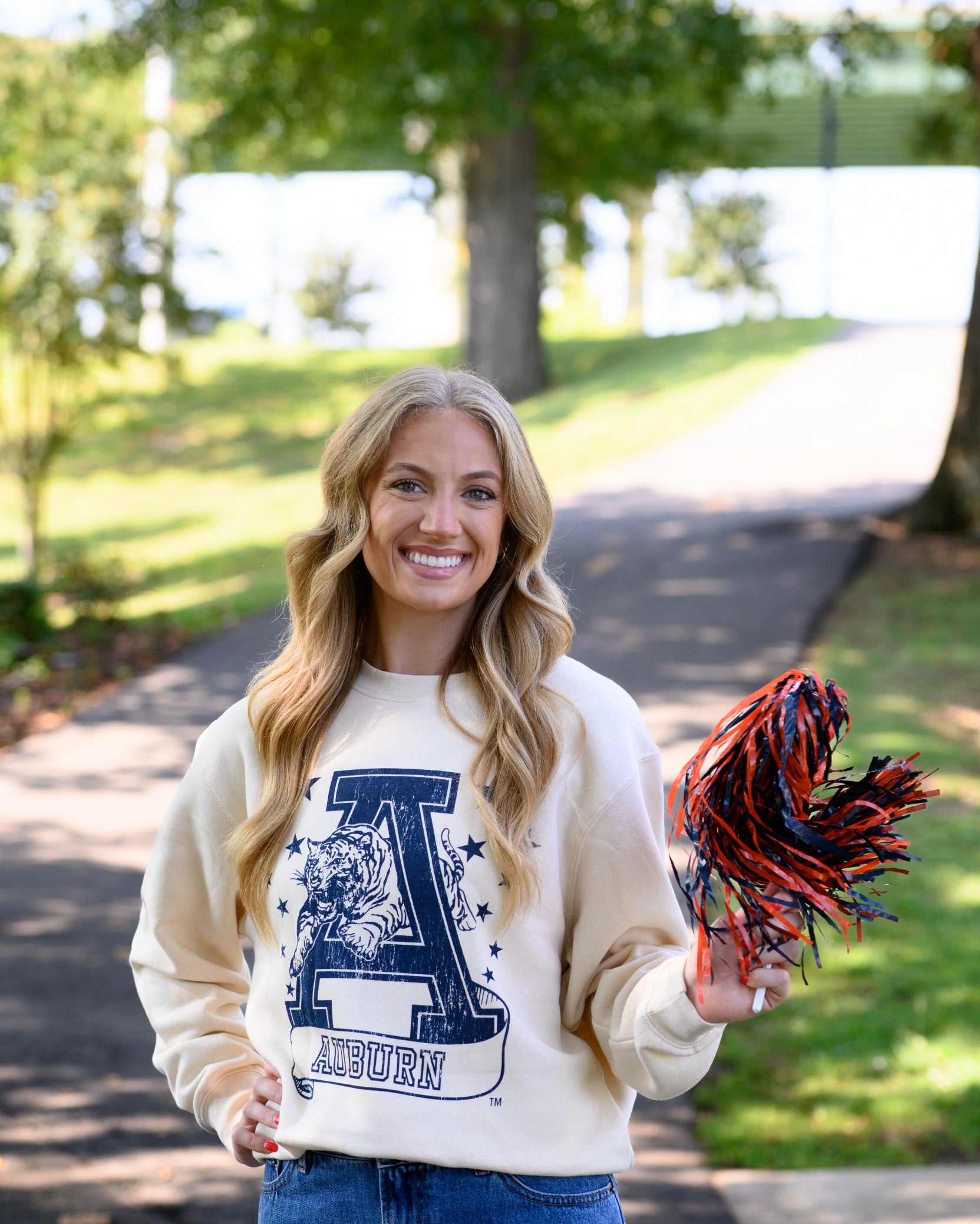 Auburn University Ivory Sweatshirt with Navy stars surrounding a Navy Leaping Tiger Logo