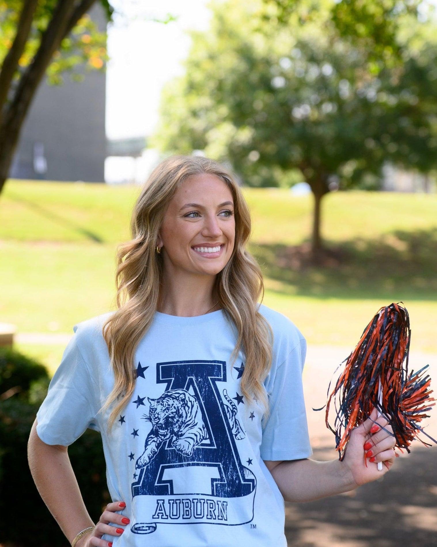 Auburn University Light Blue T-Shirt with Navy stars surrounding a Navy Leaping Tiger Logo