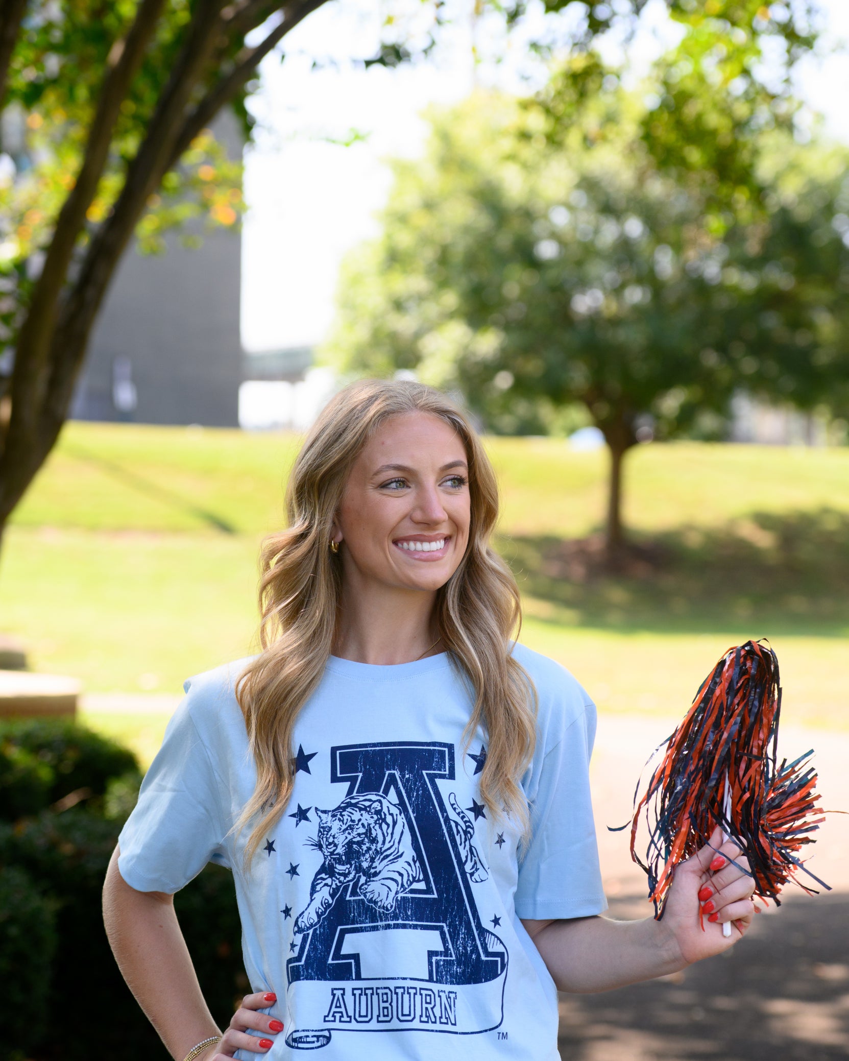 Auburn University Light Blue T-Shirt with Navy stars surrounding a Navy Leaping Tiger Logo