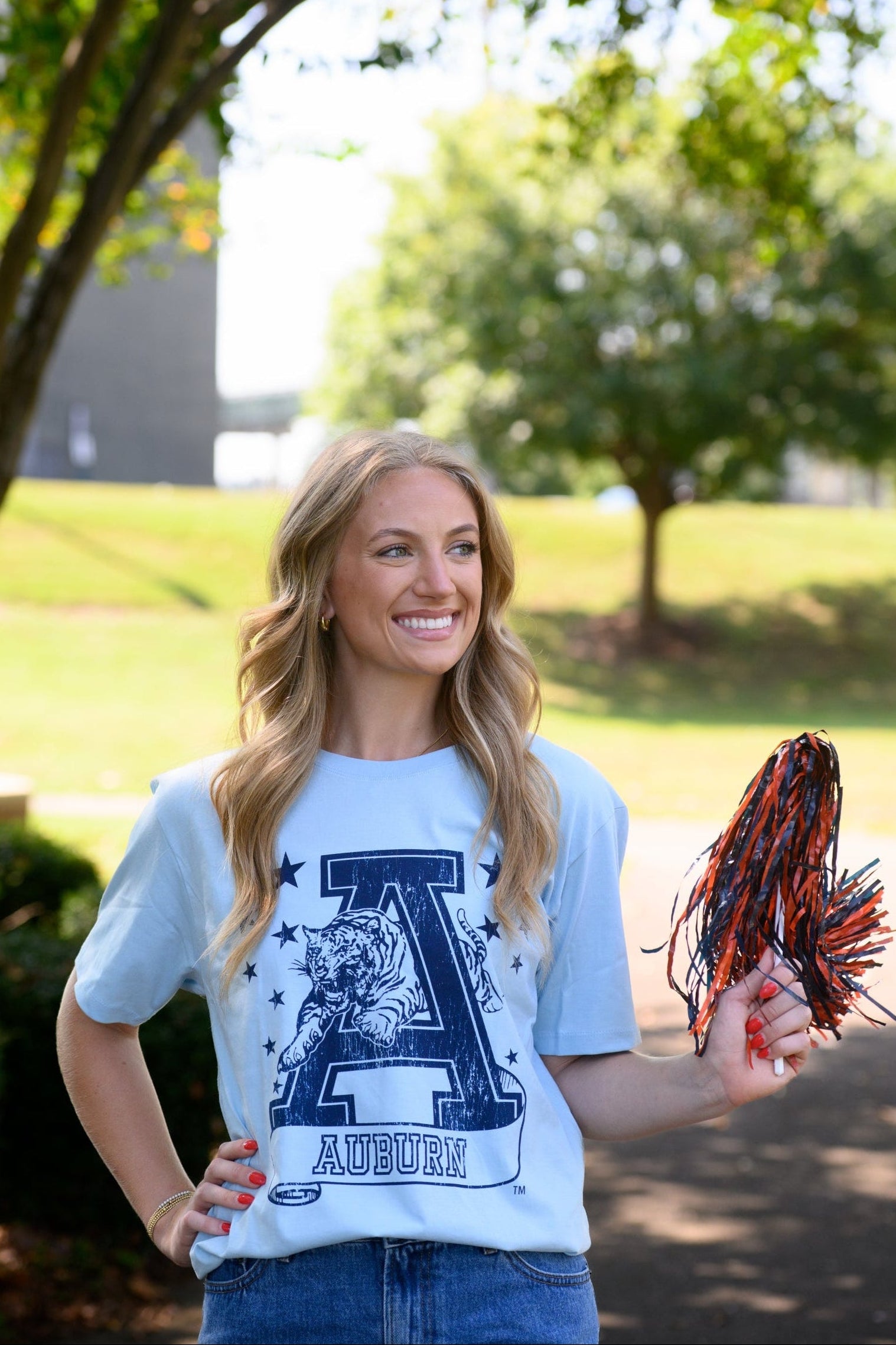 Auburn University Light Blue T-Shirt with Navy stars surrounding a Navy Leaping Tiger Logo