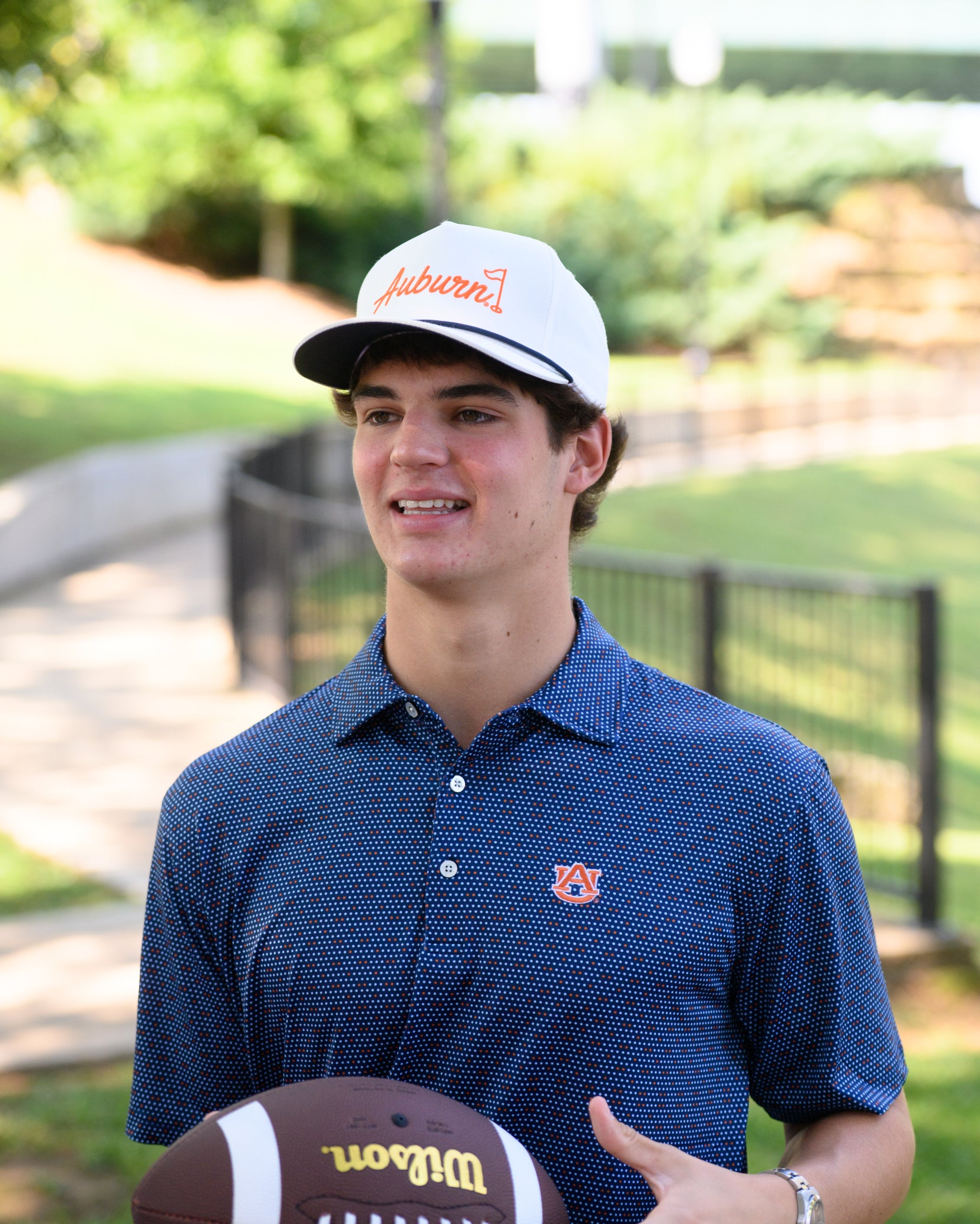 Auburn University AU Team Dot Polo (AU Logo) Navy Men's JNJ Performance Polo with a pattern of Light Blue and Orange Dots and AU Logo Embroidery