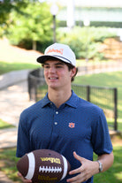 Auburn University AU Team Dot Polo (AU Logo) Navy Men's JNJ Performance Polo with a pattern of Light Blue and Orange Dots and AU Logo Embroidery
