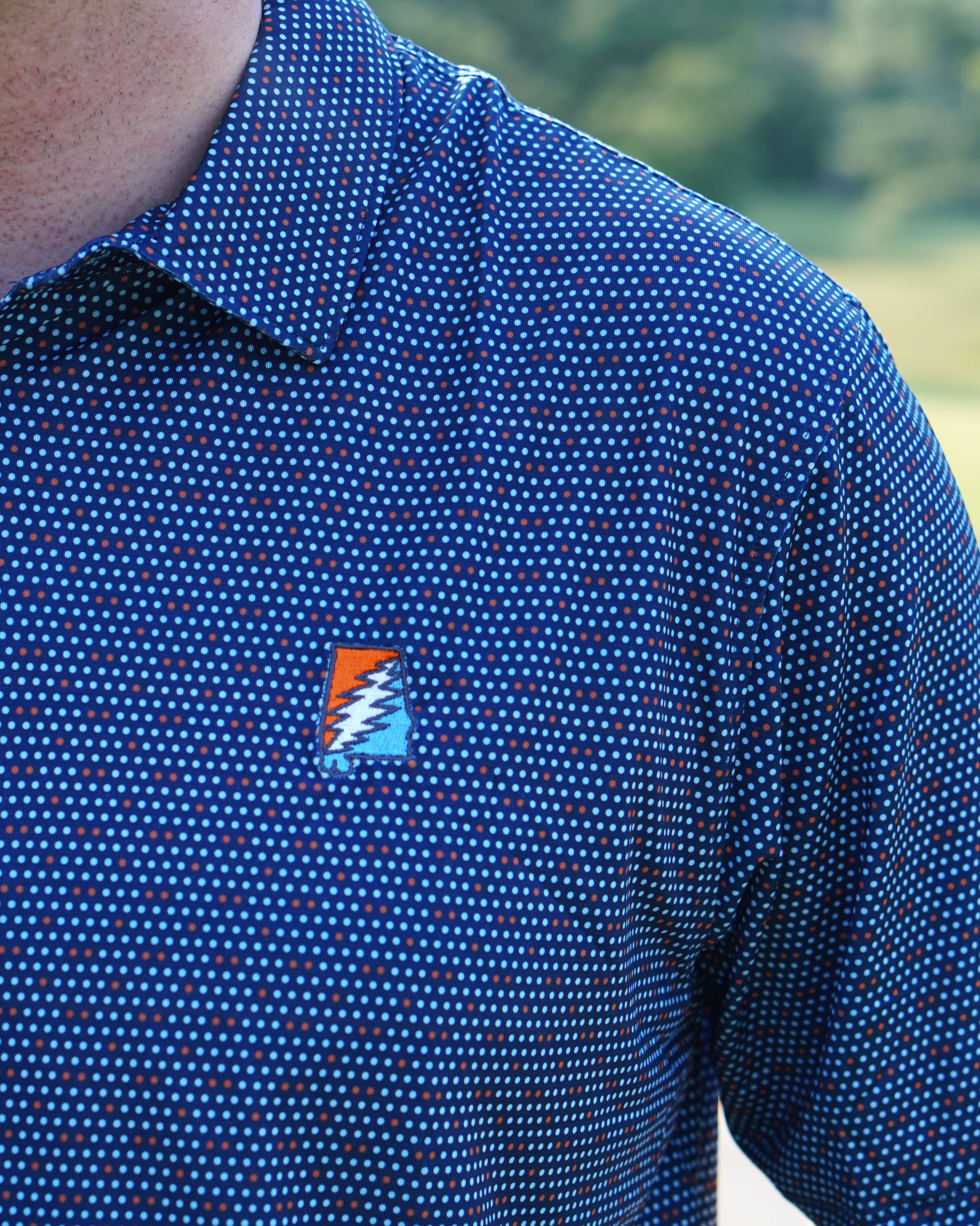 Auburn University AU Team Dot Polo (Grateful State) Navy Men's JNJ Performance Polo  with a pattern of Light Blue and Orange Dots and Embroidered Orange and Blue Grateful State Logo