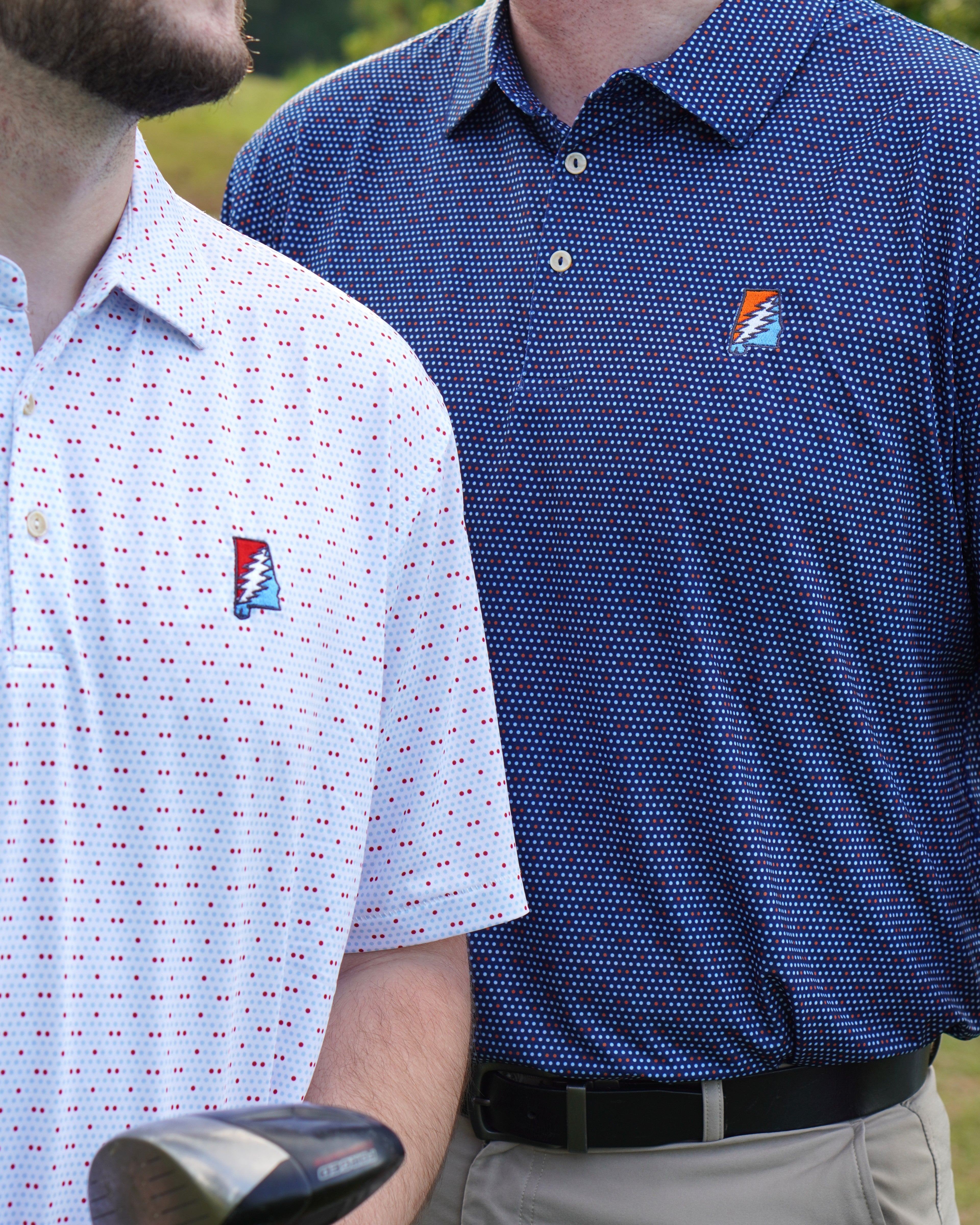 Auburn University AU Team Dot Polo (Grateful State) Navy Men's JNJ Performance Polo  with a pattern of Light Blue and Orange Dots and Embroidered Orange and Blue Grateful State Logo