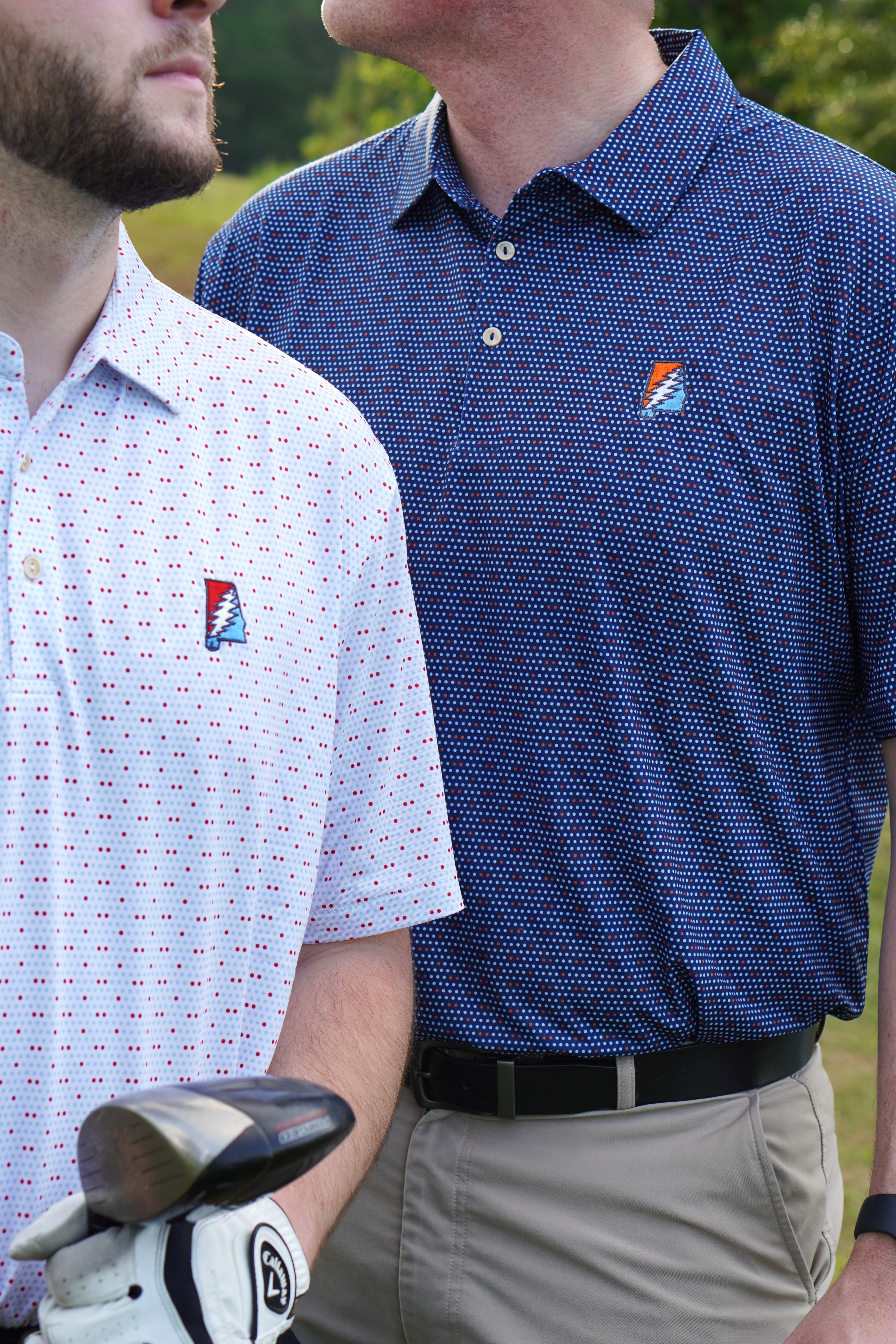 Auburn University AU Team Dot Polo (Grateful State) Navy Men's JNJ Performance Polo  with a pattern of Light Blue and Orange Dots and Embroidered Orange and Blue Grateful State Logo
