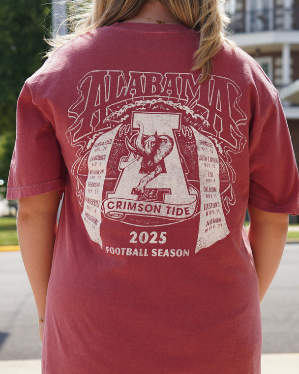 University of Alabama Crimson T-Shirt with an image of the Vintage A Logo surrounded by scrolls that read the 2025 Alabama football schedule