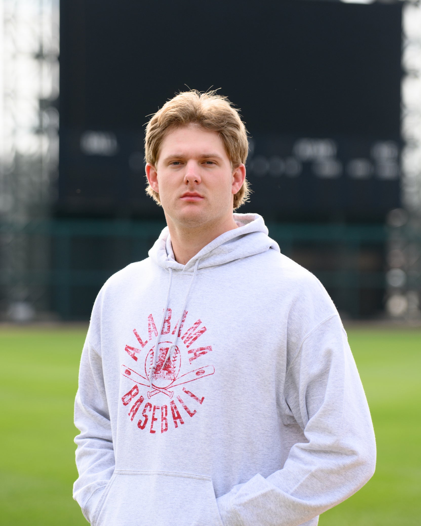 University of Alabama Distressed Light Grey Hoodie with a Red Baseball featuring the Vintage A logo over crossed baseball bats, surrounded by Red text “Alabama Baseball”