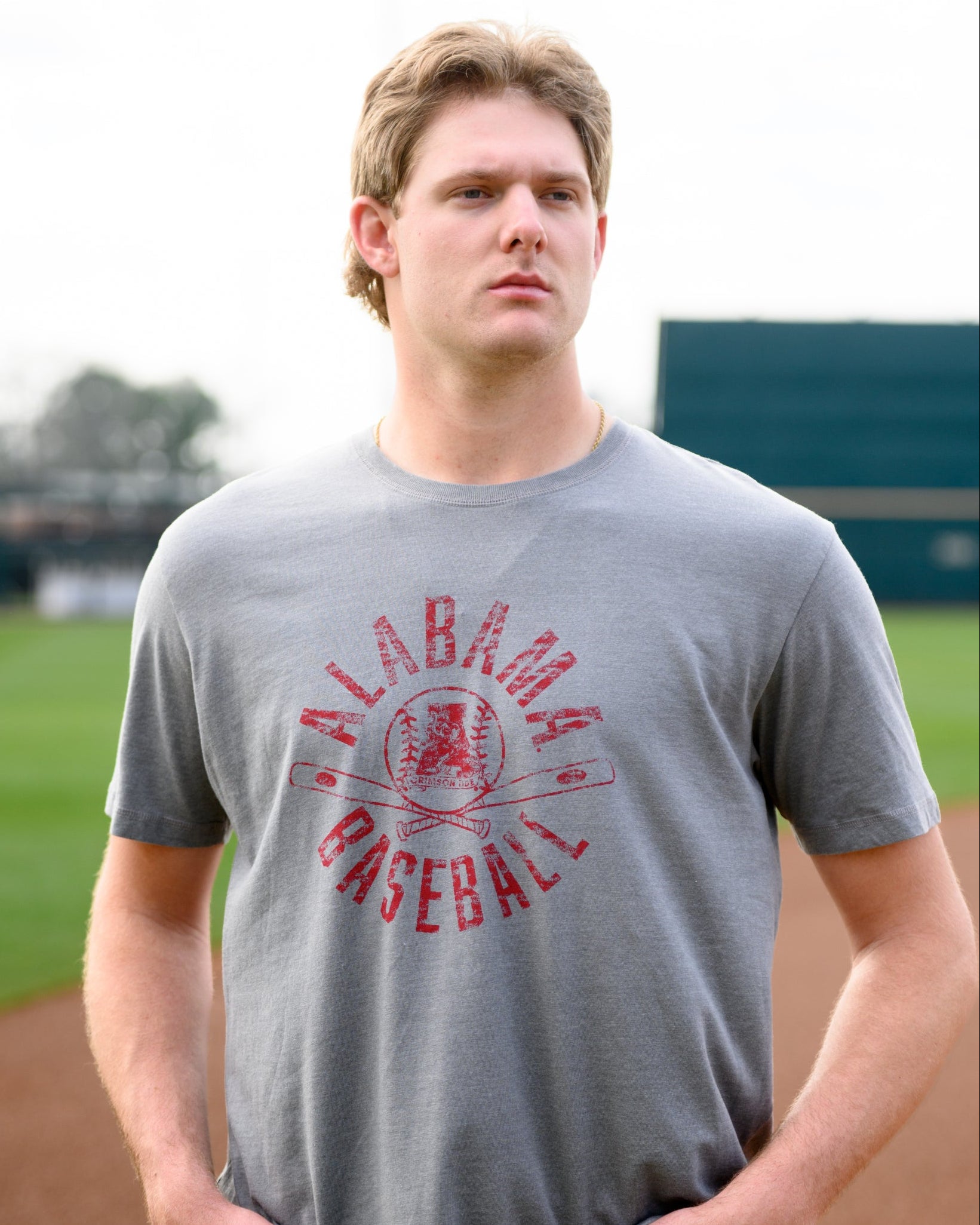 University of Alabama Distressed Grey T-Shirt with a Red Baseball featuring the Vintage A logo over crossed baseball bats, surrounded by White text “Alabama Baseball”