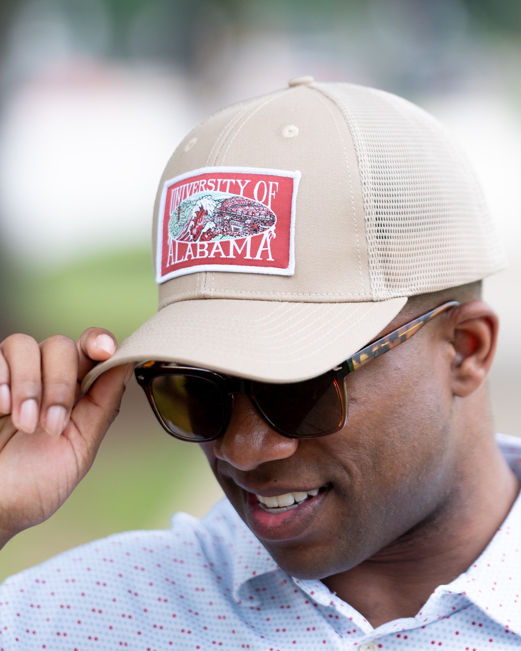 University of Alabama Beige Campus Trucker Hat with a patch that features the University of Alabama logo.