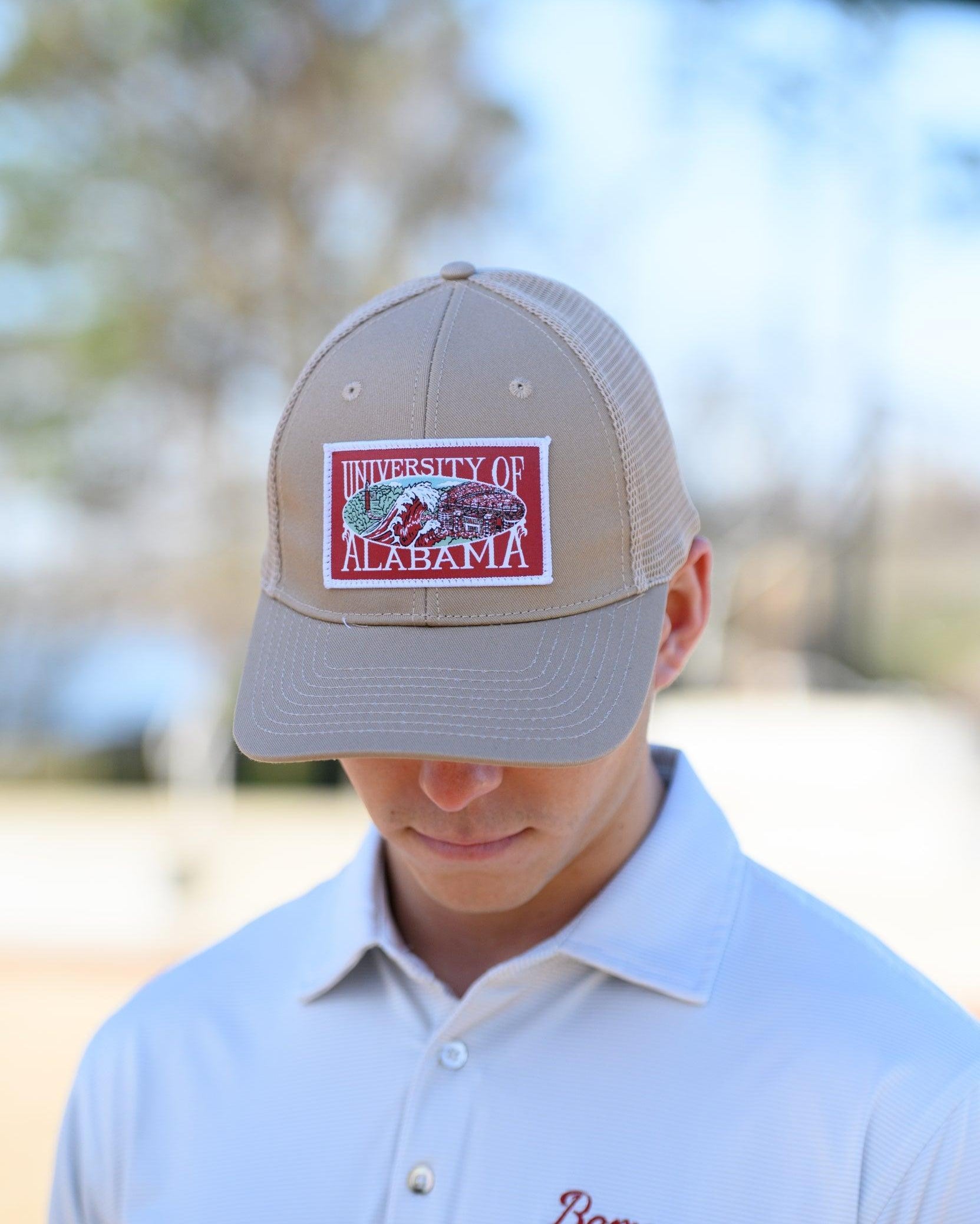 University of Alabama Beige Trucker Hat with a patch that features the University of Alabama logo.