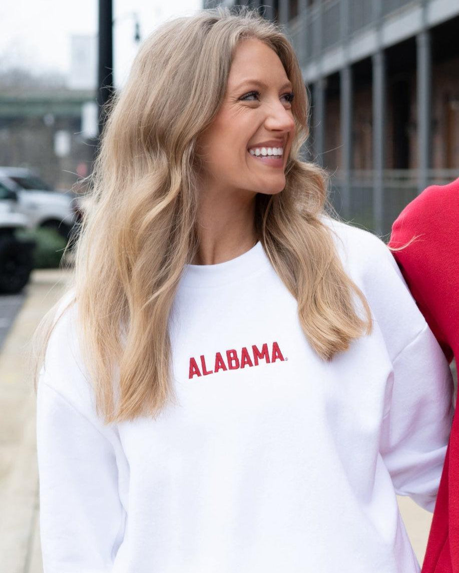 University of Alabama White American Apparel Sweatshirt with 'ALABAMA' embroidered on the front in red letters.
