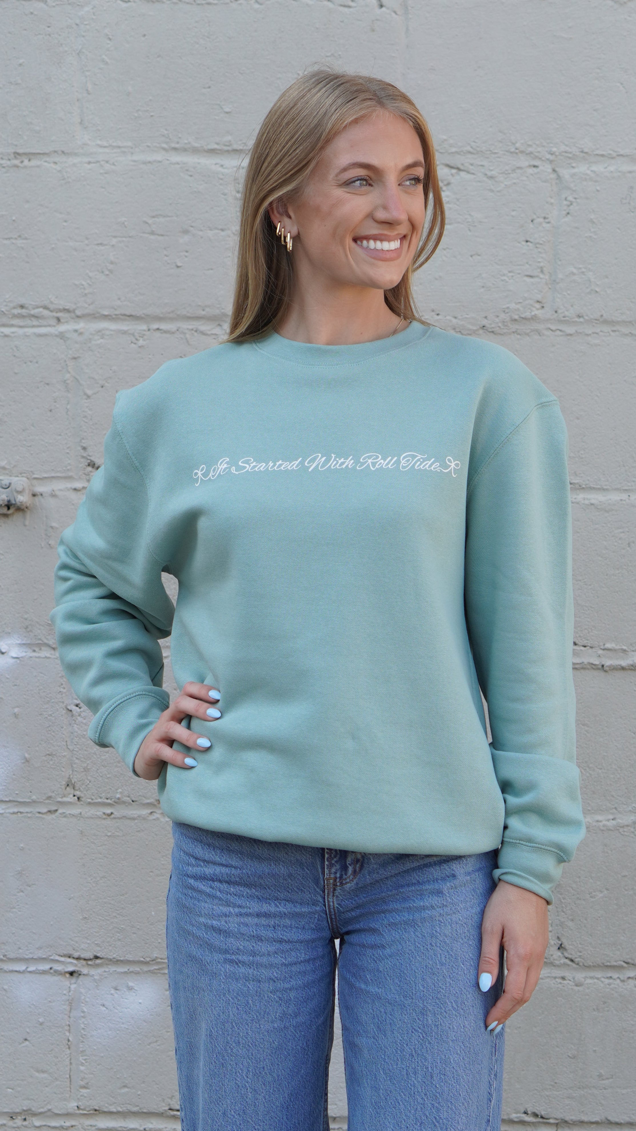 University of Alabama Seafoam Crewneck with cursive writing on the front and an open locket with the writing “Bama” inside on the back