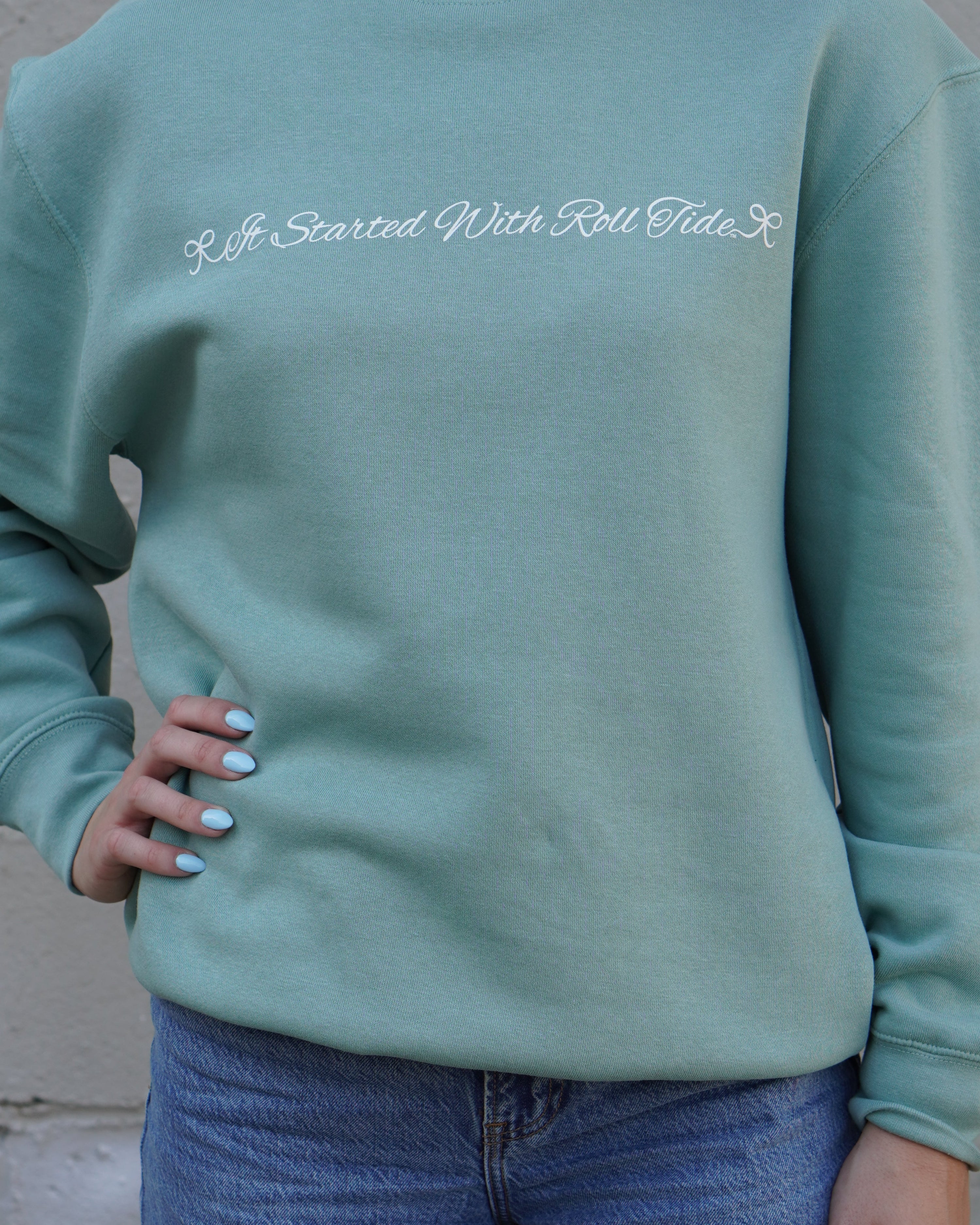 University of Alabama Seafoam Crewneck with cursive writing on the front and an open locket with the writing “Bama” inside on the back