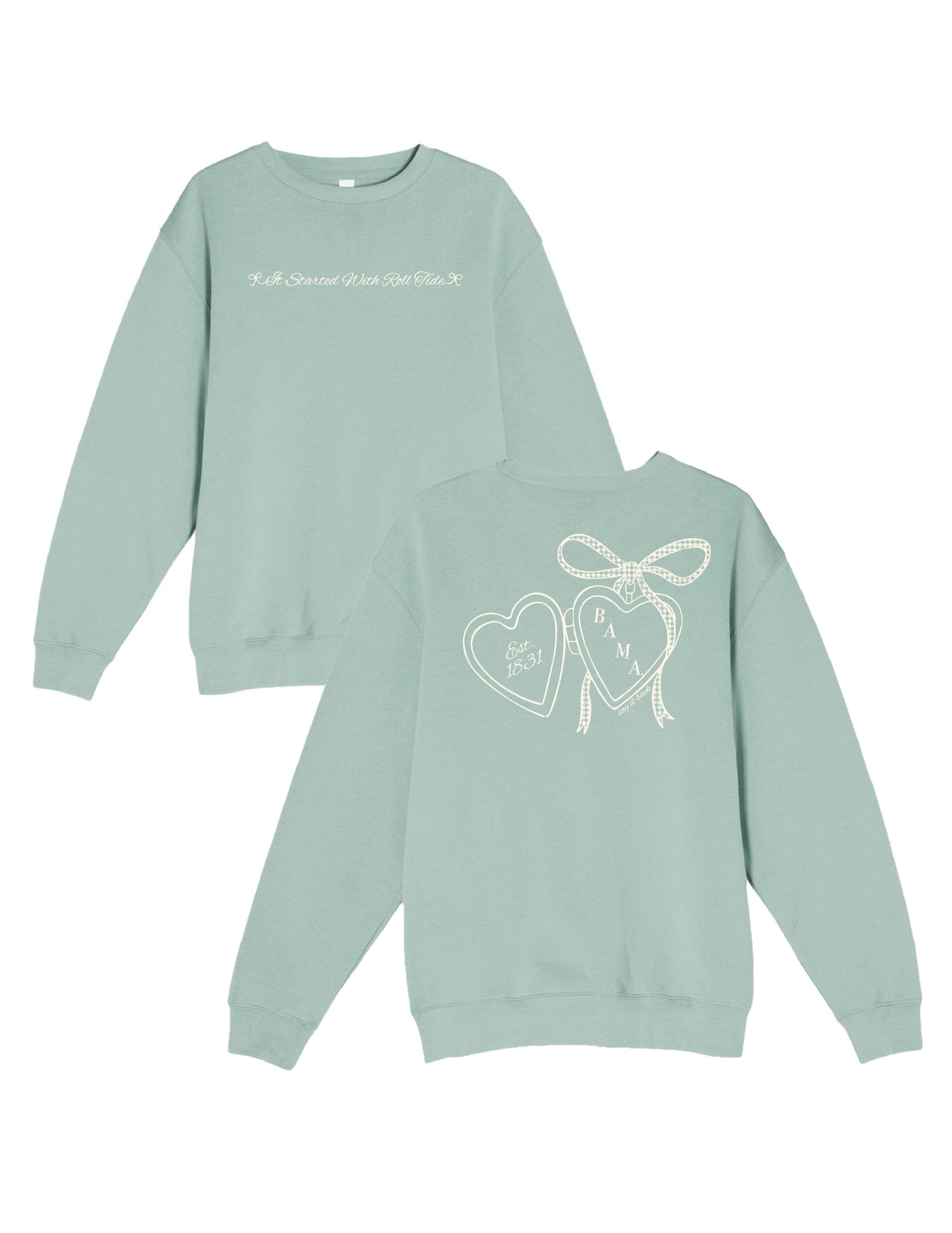 University of Alabama Seafoam Crewneck with cursive writing on the front and an open locket with the writing “Bama” inside