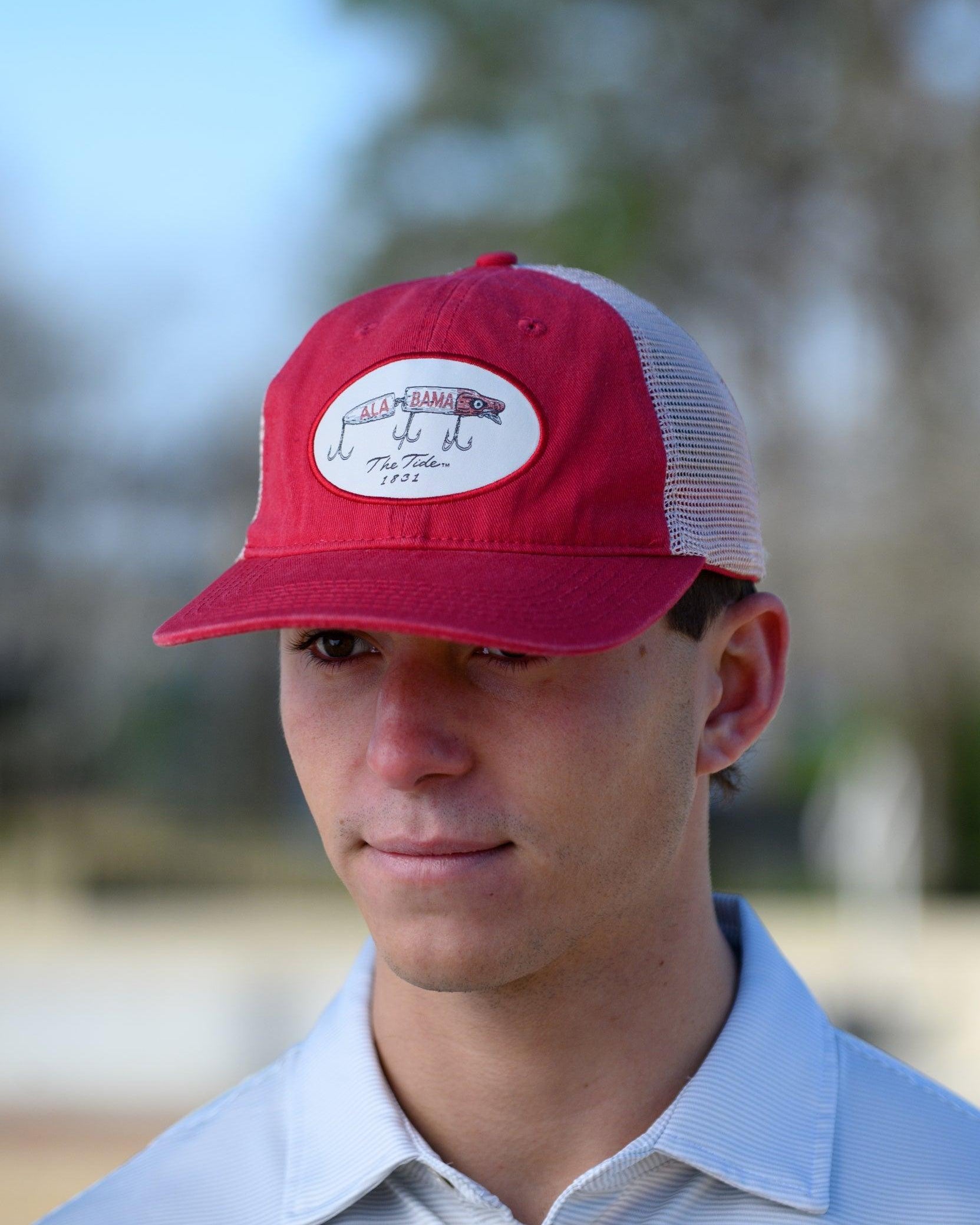 University of Alabama Red Trucker Hat Featuring a patch with an image of a fishing lure with Red text "Alabama"