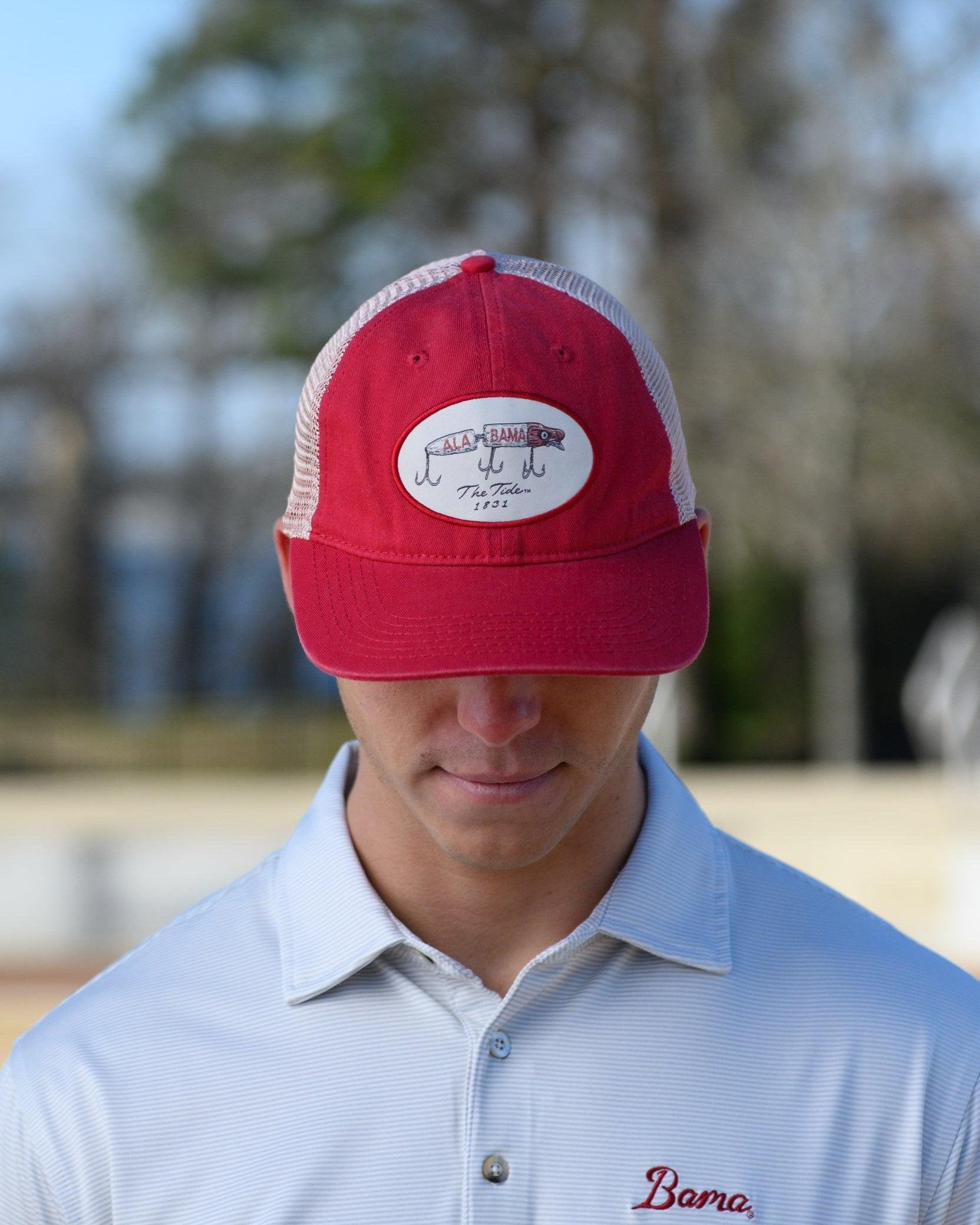 University of Alabama Red Trucker Hat Featuring a patch with an image of a fishing lure with Red text "Alabama"