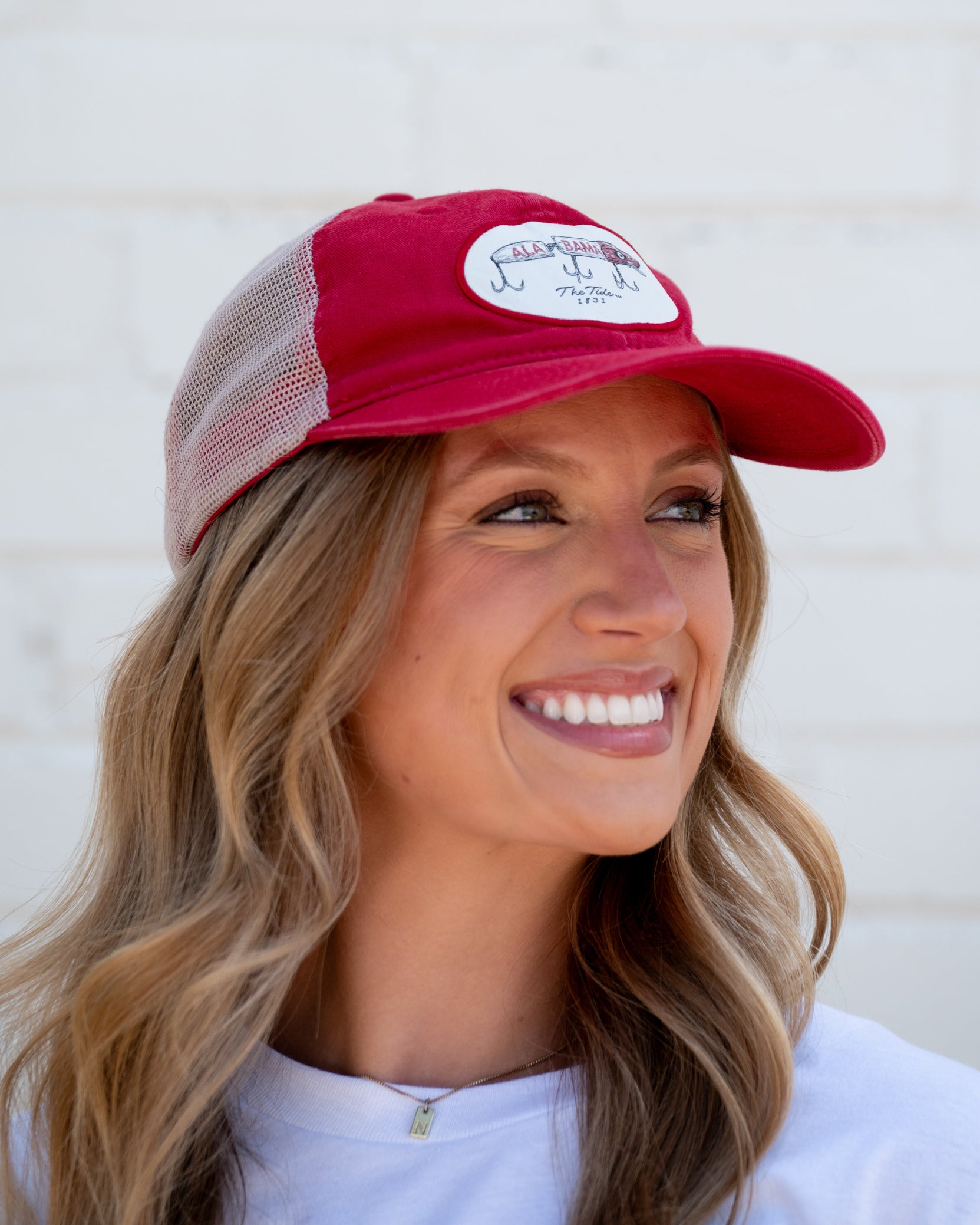 University of Alabama Red Hat Featuring a patch with an image of a fishing lure with Red text "Alabama"