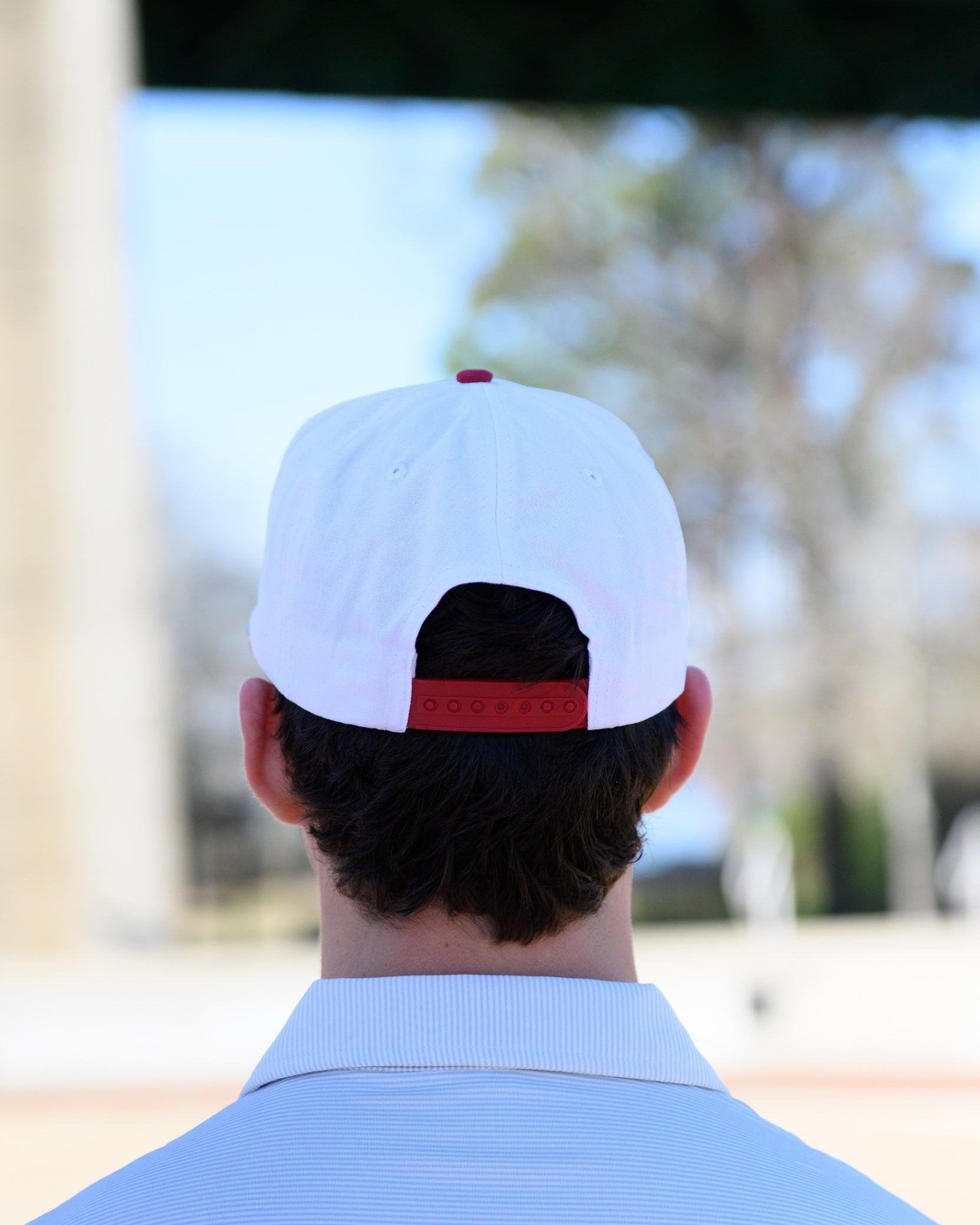 University of Alabama White and Red Hat with Red “Alabama” embroidery and Light Grey text “Crimson Tide."
Snapback Hat