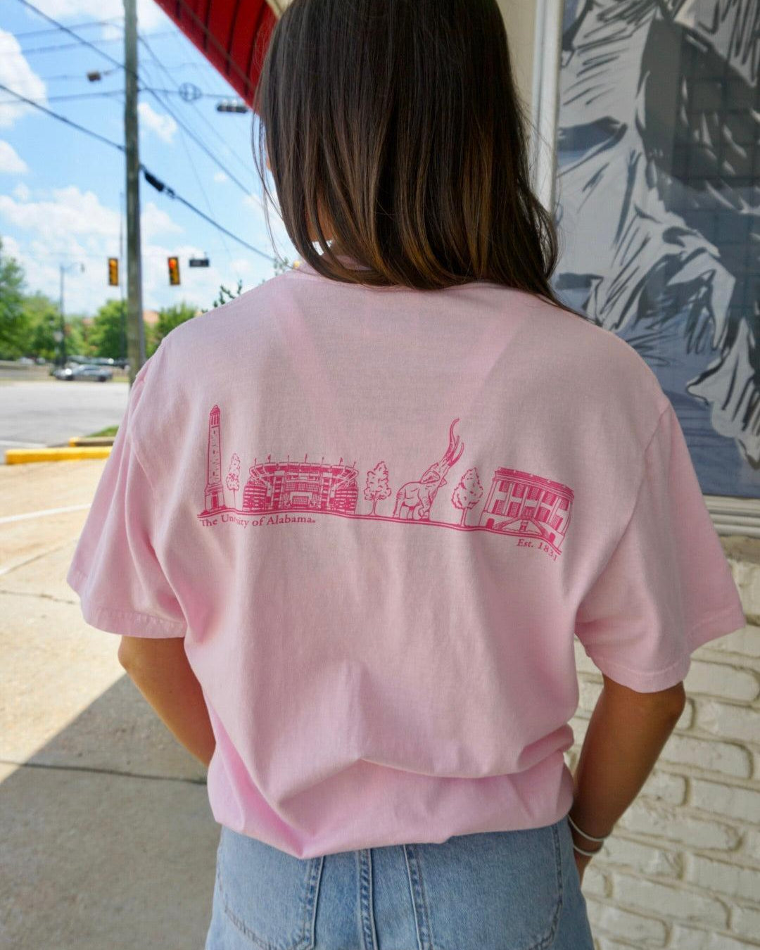Local Merch Light Pink T-Shirt with Pink sketches of Denny Chimes, Bryant-Denny Stadium, the Tuska Stature, and President’s Mansion on the back
