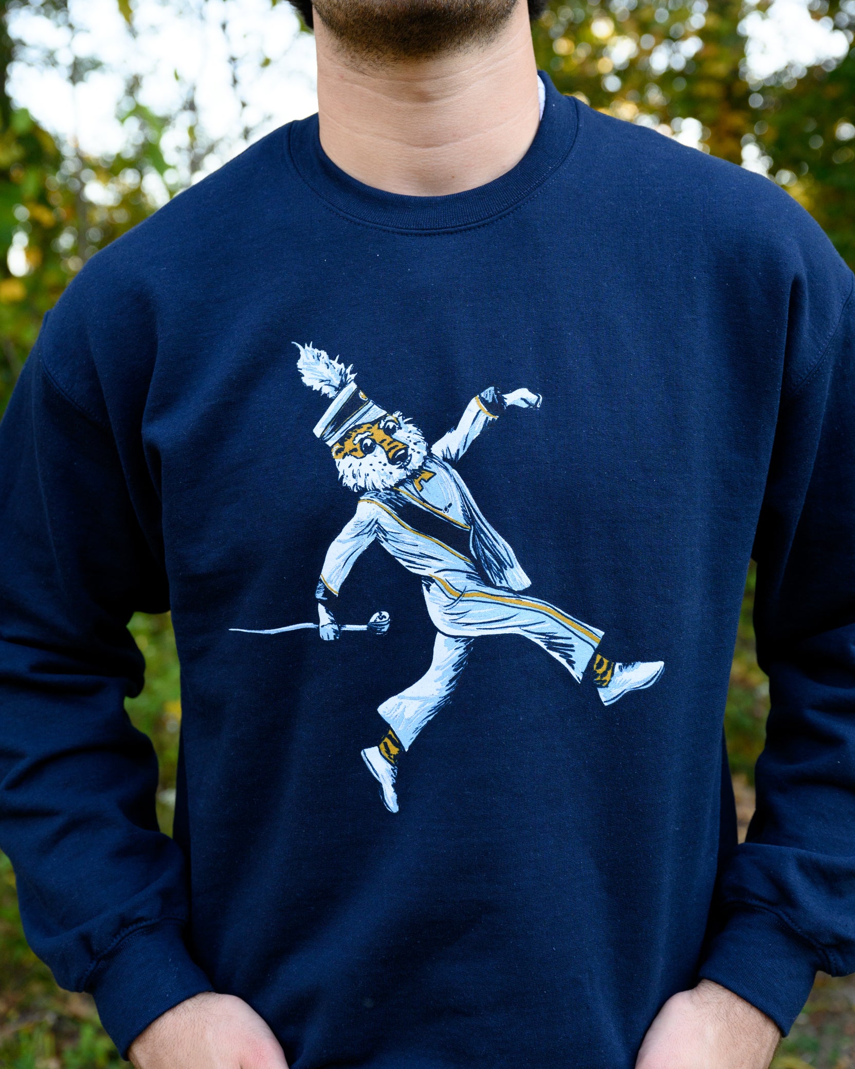 Auburn University Aubie Drum Major  Navy Hanes Sweatshirt with an image of Aubie the Tiger wearing a Drum Major's outfit and marching with the baton