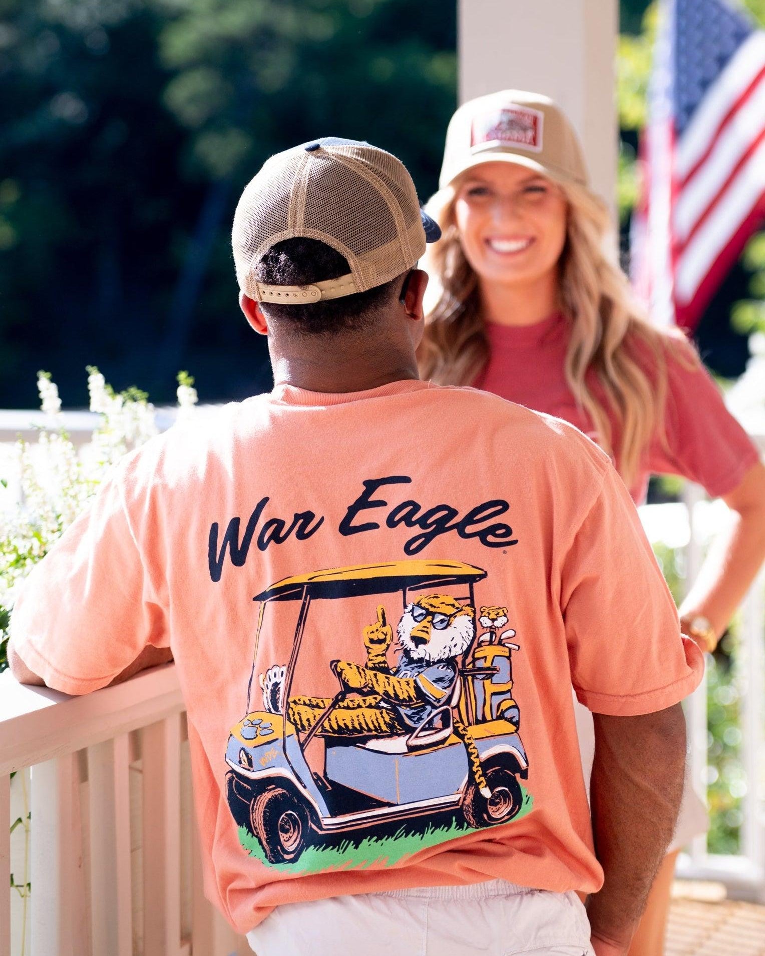 Auburn University Aubie Golf Cart Terracotta Comfort Colors T-Shirt with the text "War Eagle" above an image of Aubie the Tiger wearing sunglasses and driving a golf cart