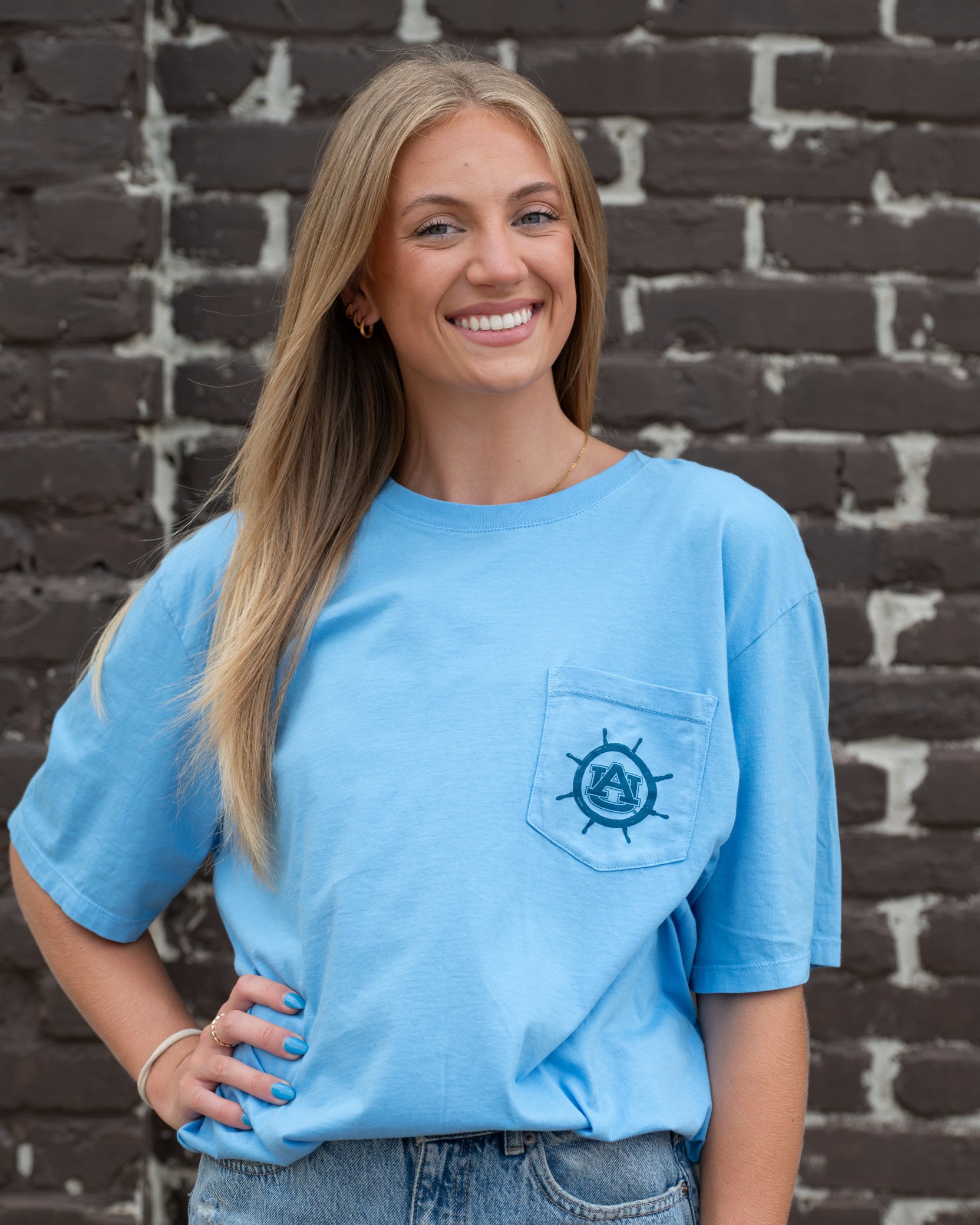Auburn University Blue Shirt with a Front Pocket featuring a ship’s wheel circling the classic AU Logo
