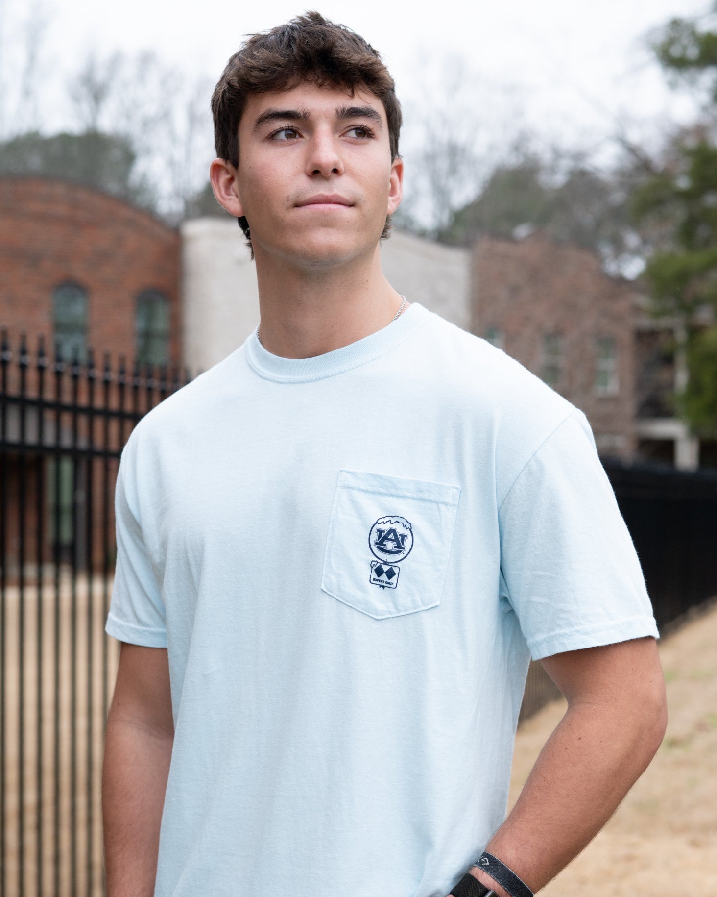 Auburn University Light Blue T-Shirt with a snow-covered Classic AU Logo on the front pocket