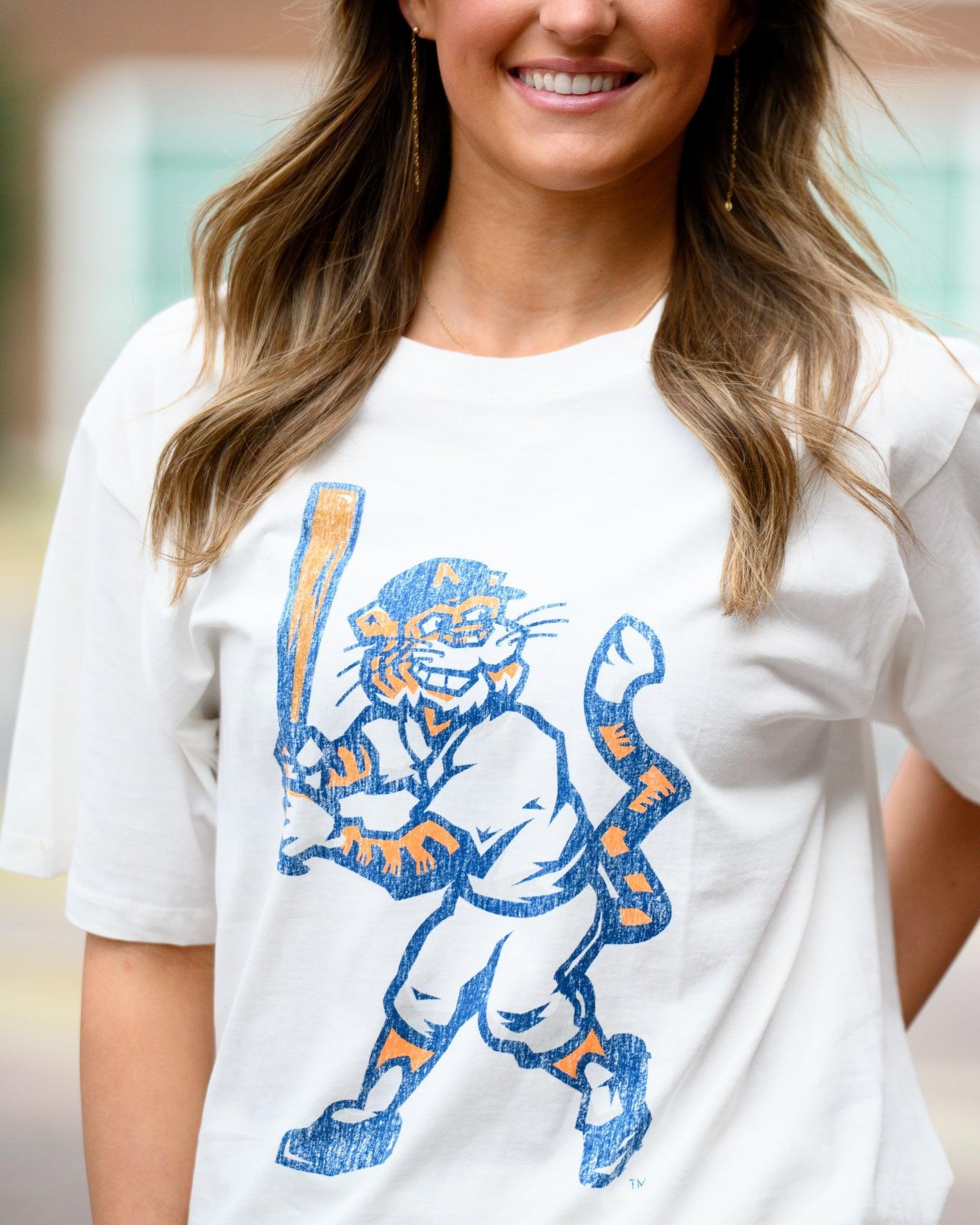 Auburn University Aubie Vintage Baseball Ivory SoftShirts T-Shirt with an image of a vintage Aubie in a baseball uniform holding a baseball bat
