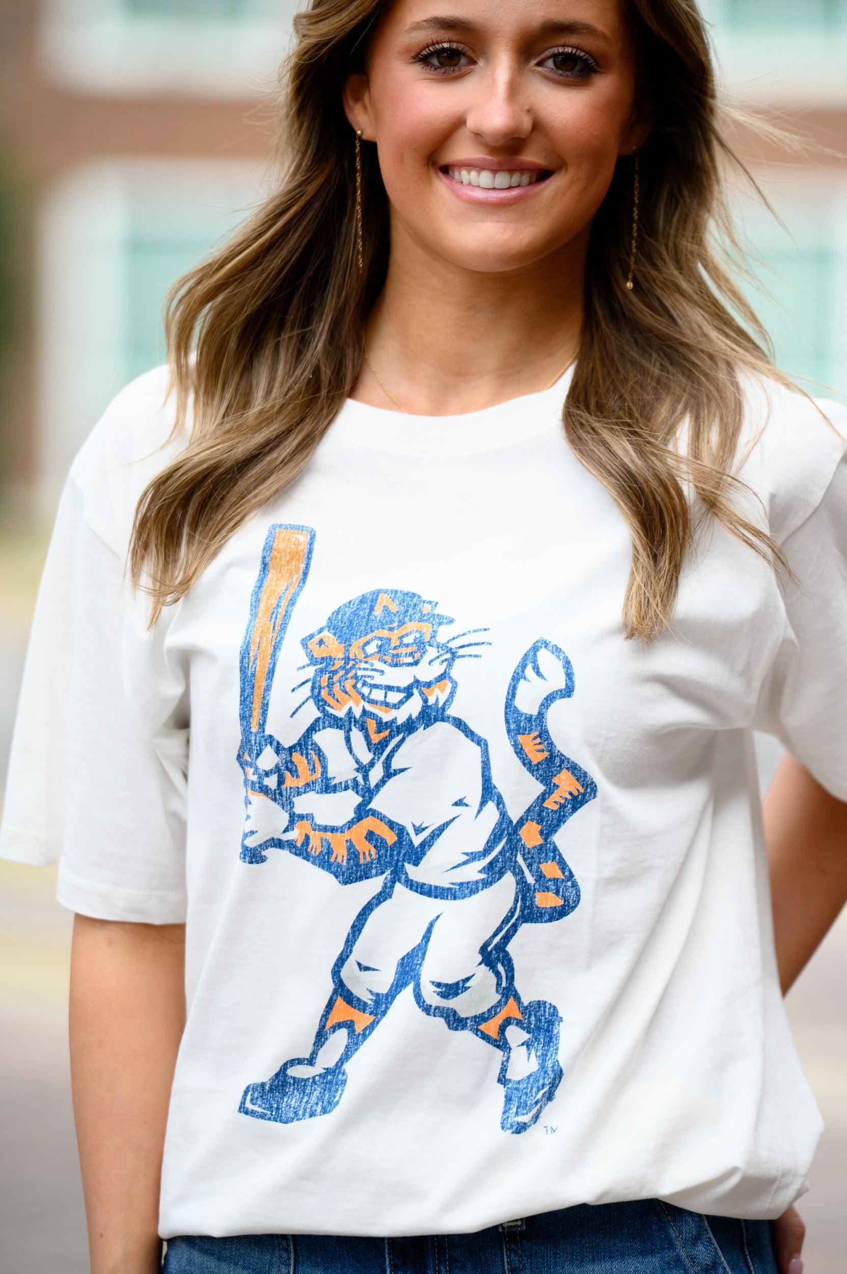 Auburn University Aubie Vintage Baseball Ivory SoftShirts T-Shirt with an image of a vintage Aubie in a baseball uniform holding a baseball bat