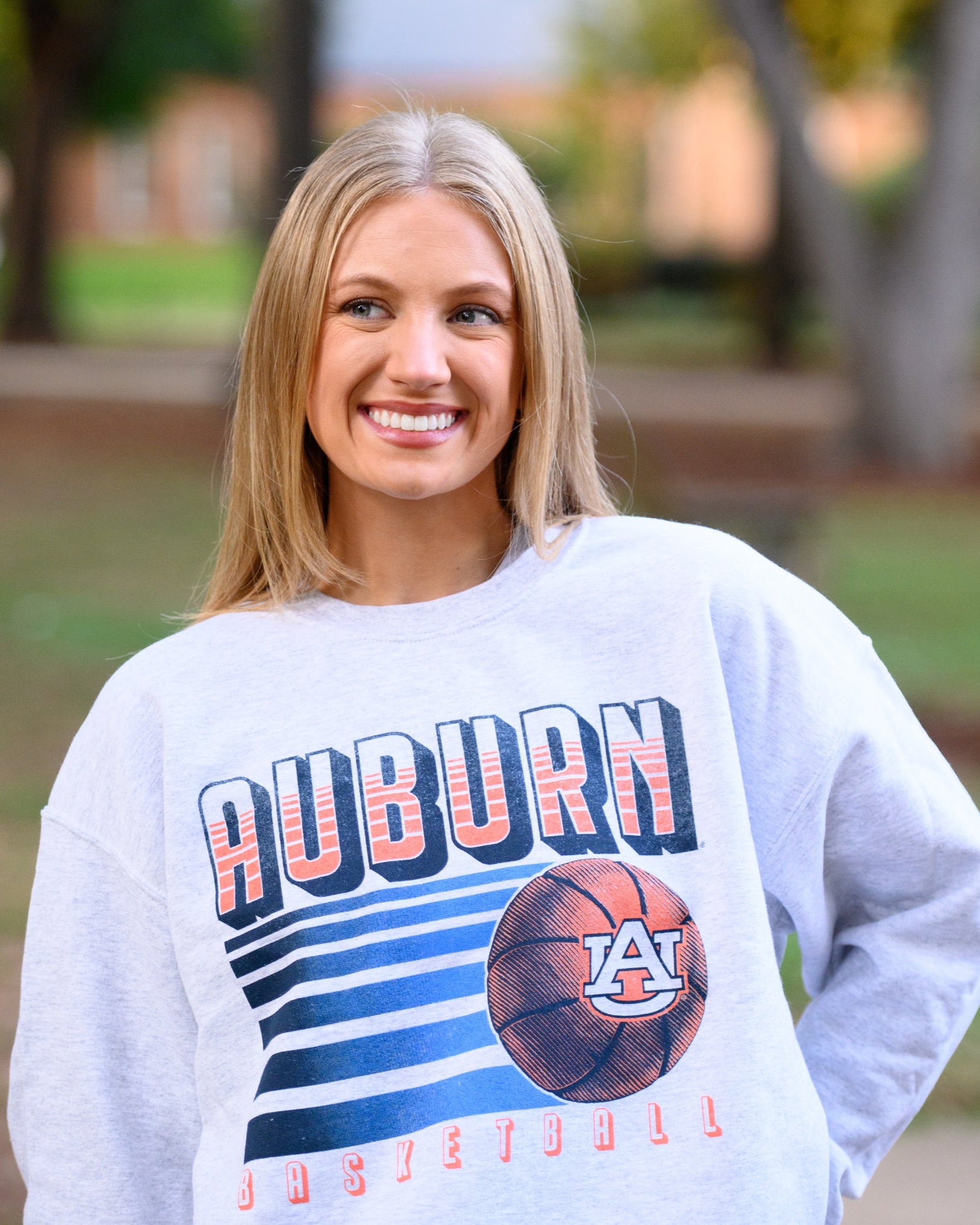 Auburn University Auburn Basketball Vintage Grey Gildan Sweatshirt with retro style Orange text "Auburn" and an image of a basketball with the AU Logo