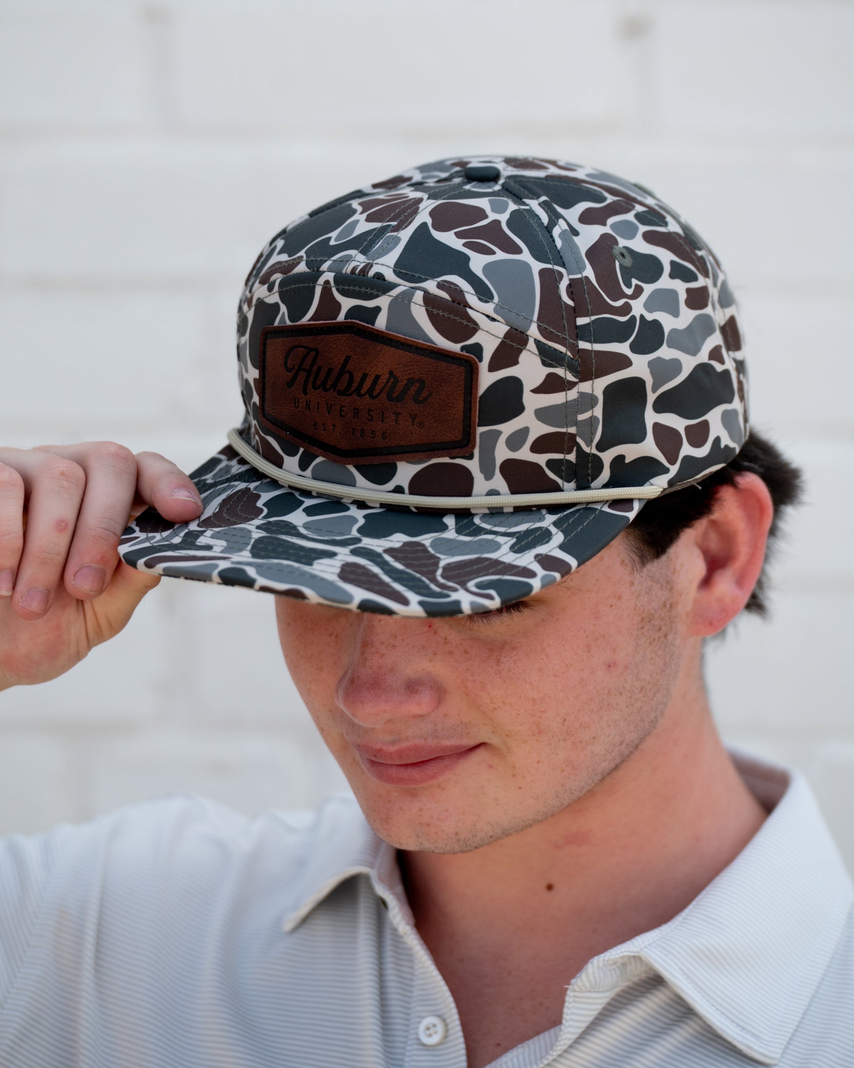 Auburn University Camo Hat with White rope and Leather patch with text "Auburn University"