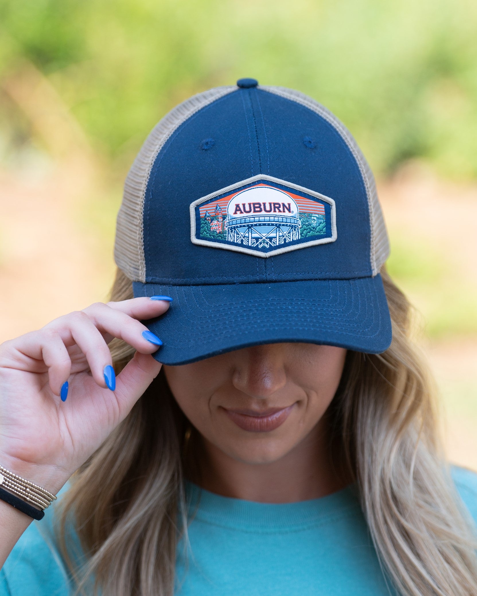 Auburn University Navy Trucker Hat with a woven patch depicting the Auburn University campus.