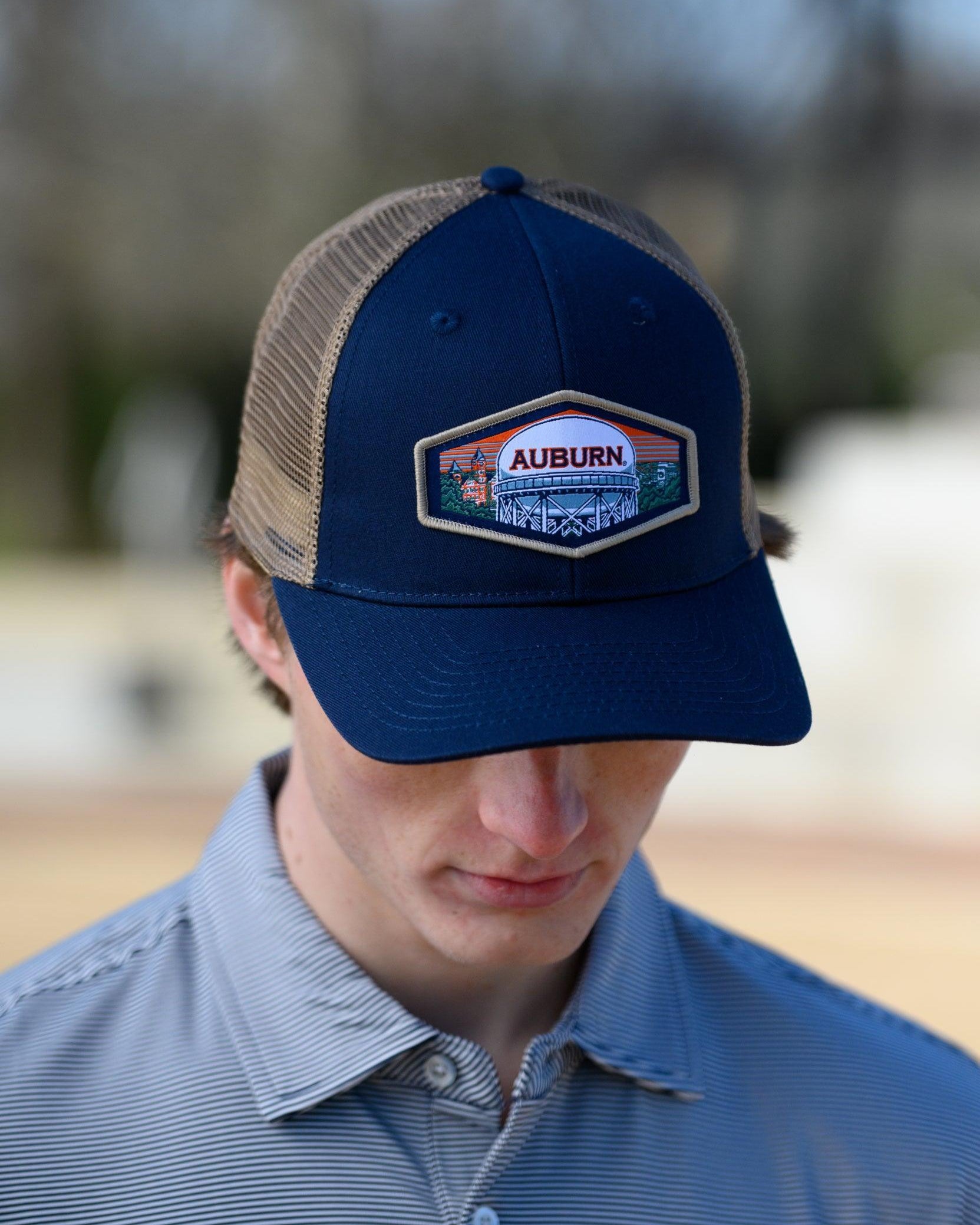 Auburn University Navy Trucker Hat with a woven patch depicting the Auburn University campus.