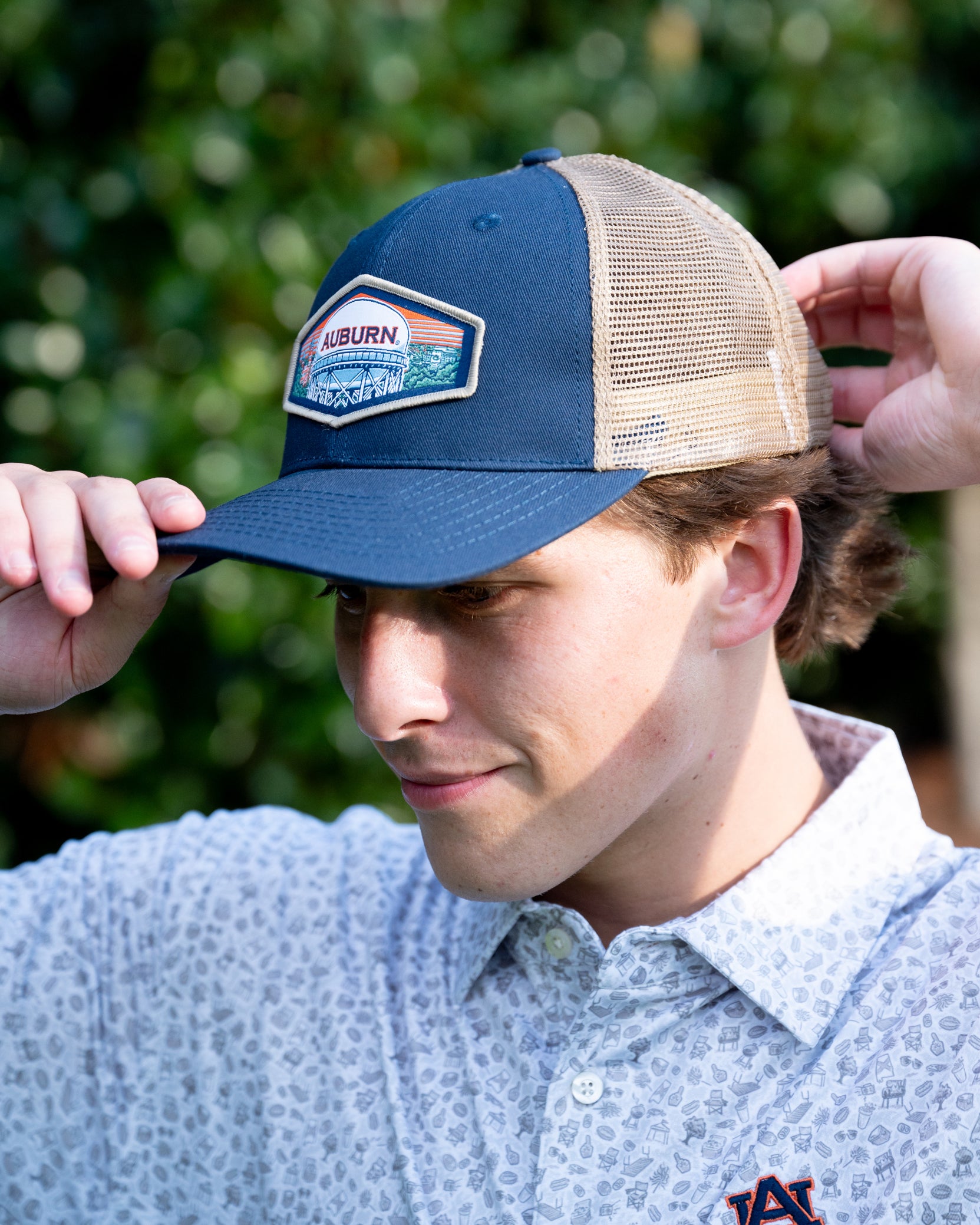 Auburn University Navy Trucker Hat with a woven patch depicting the Auburn University campus.