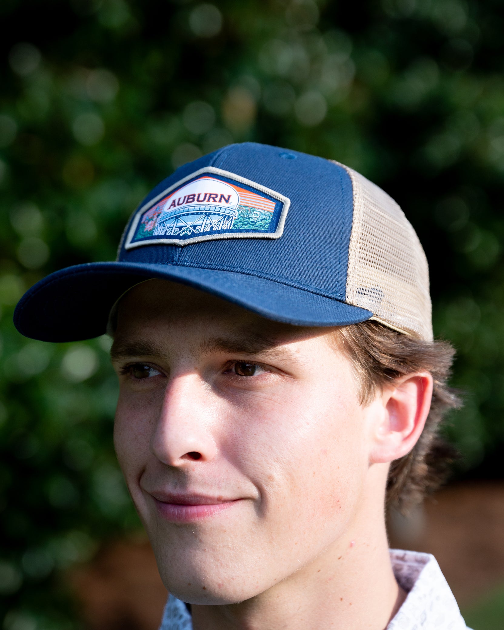 Auburn University Navy Trucker Hat with a woven patch depicting the Auburn University campus.
