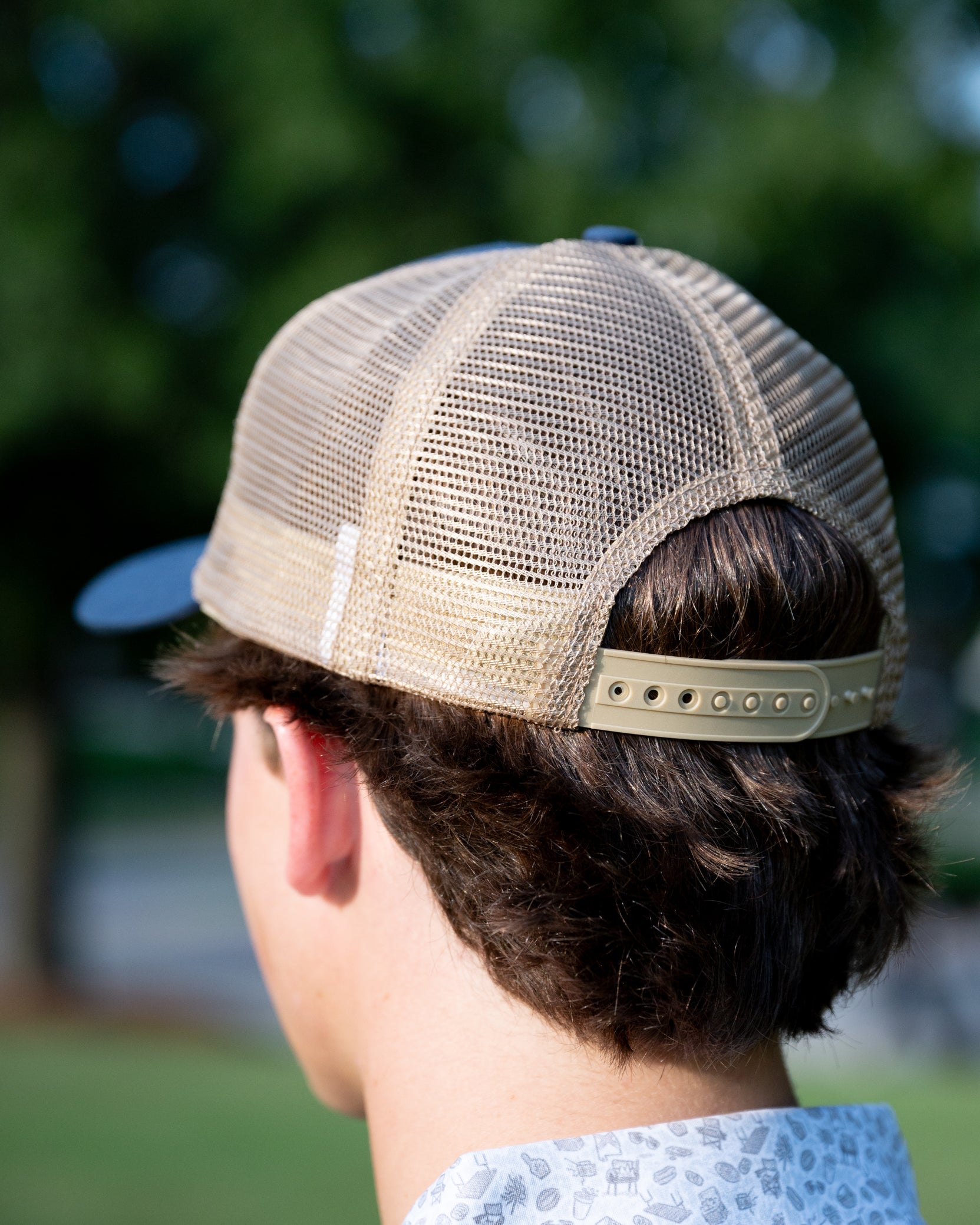 Auburn University Navy Trucker Hat with a woven patch depicting the Auburn University campus.