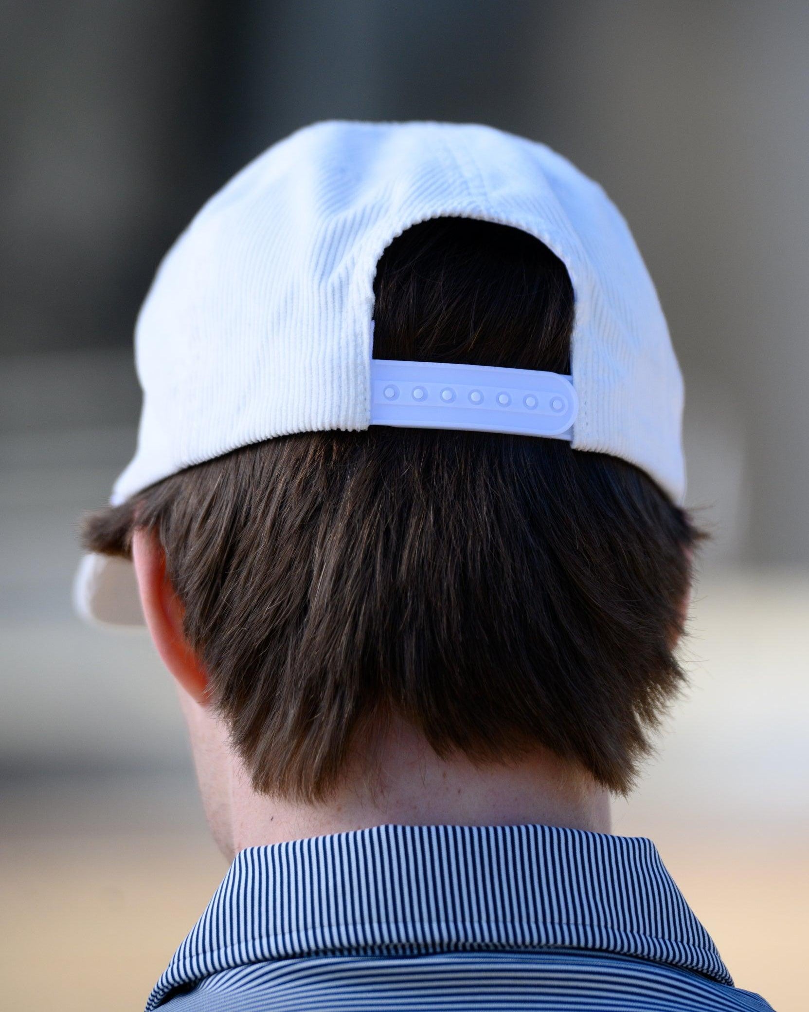 Auburn University White Hat with Navy script “Auburn Tigers."
Snapback Hat