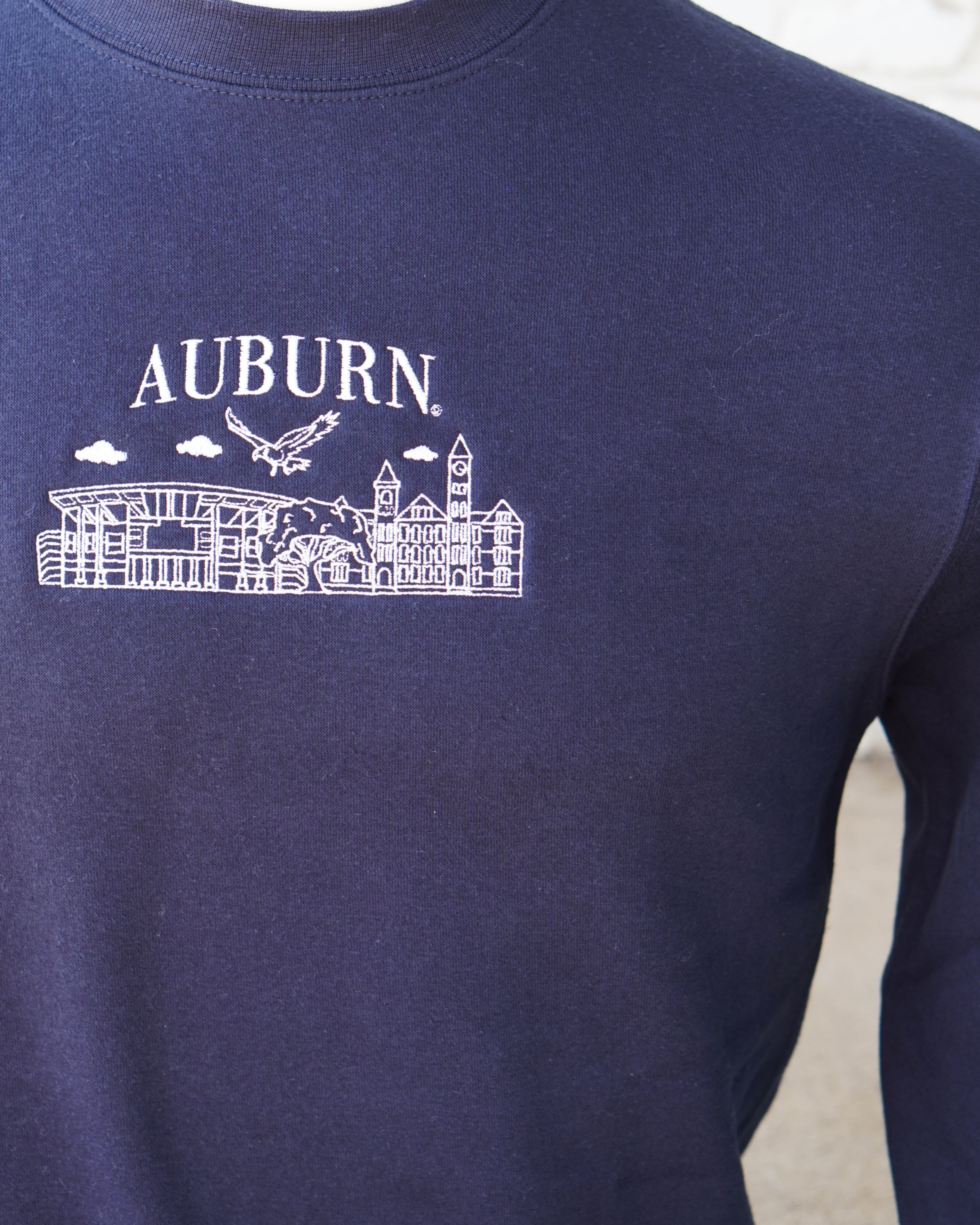 Auburn University Auburn Landmarks Navy Lane Seven Ladies' Sweatshirt with White embroidery of Auburn landmarks under text "Auburn"