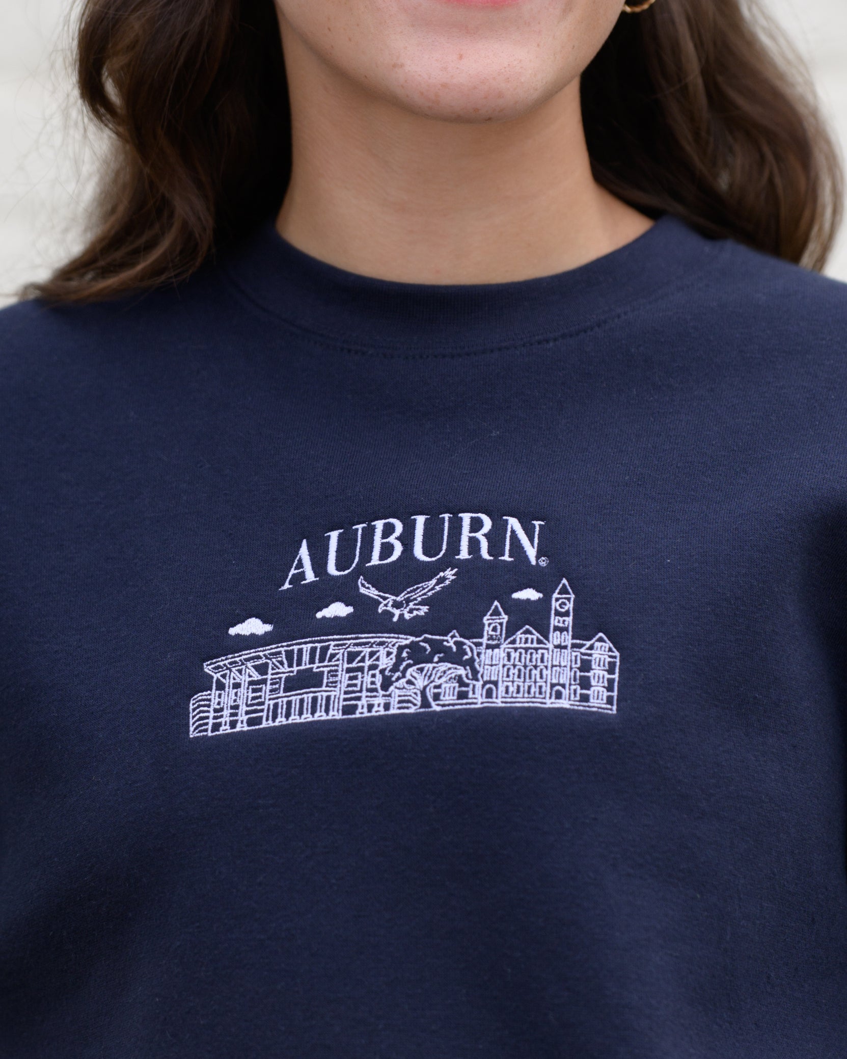 Auburn University Auburn Landmarks Navy Lane Seven Ladies' Sweatshirt with White embroidery of Auburn landmarks under text "Auburn"