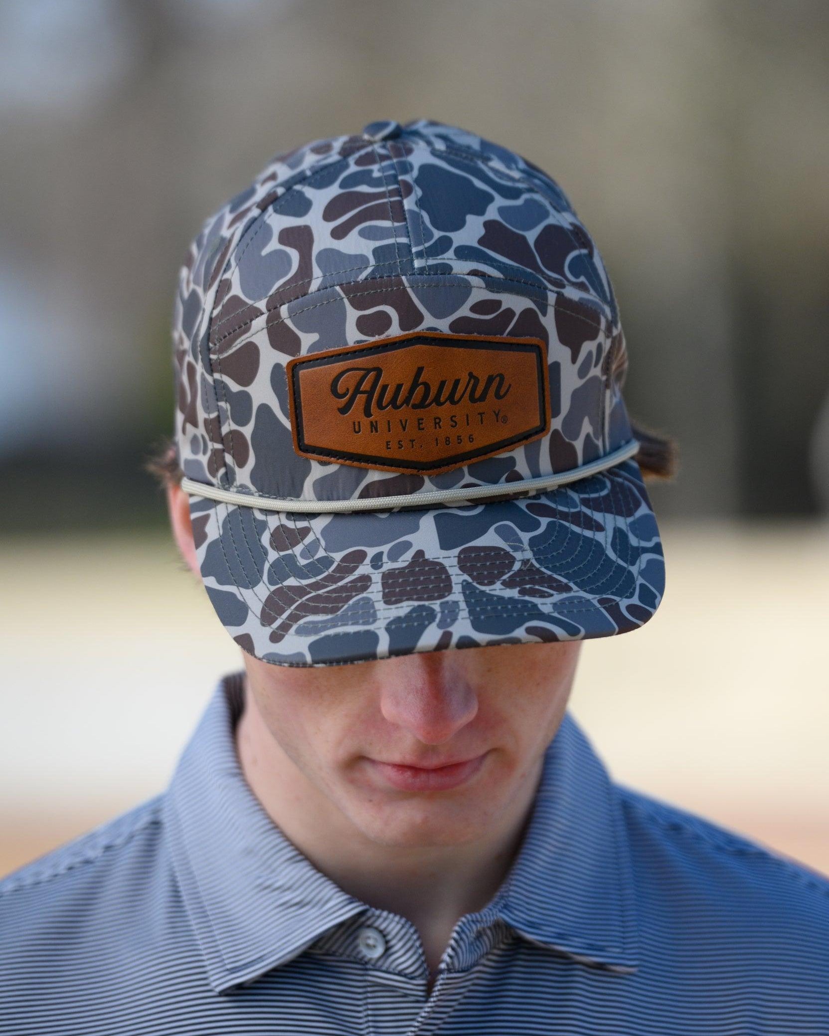 Auburn University Auburn Leather Patch Hat Duck Camo JNJ 7-Panel Hat with White rope and Leather patch with text "Auburn University"