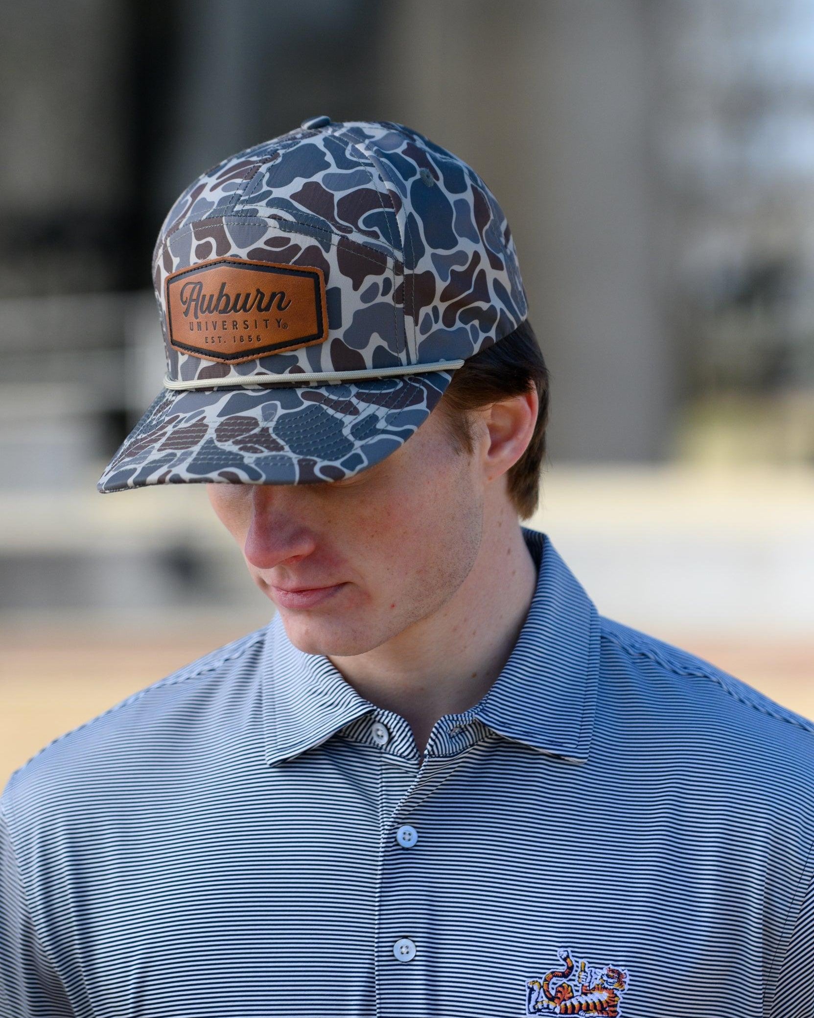 Auburn University Auburn Leather Patch Hat Duck Camo JNJ 7-Panel Hat with White rope and Leather patch with text "Auburn University"