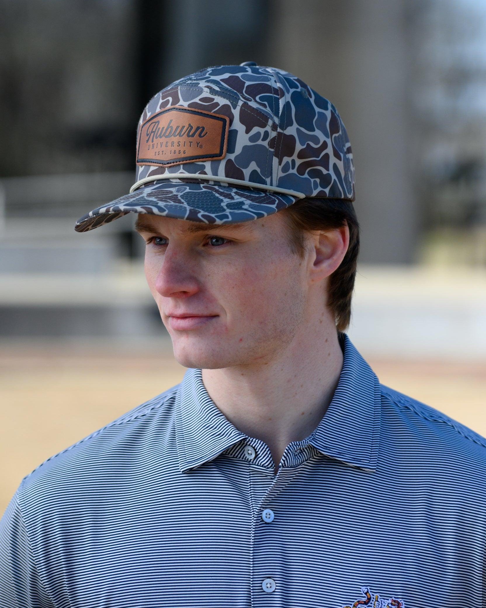 Auburn University Auburn Leather Patch Hat Duck Camo JNJ 7-Panel Hat with White rope and Leather patch with text "Auburn University"